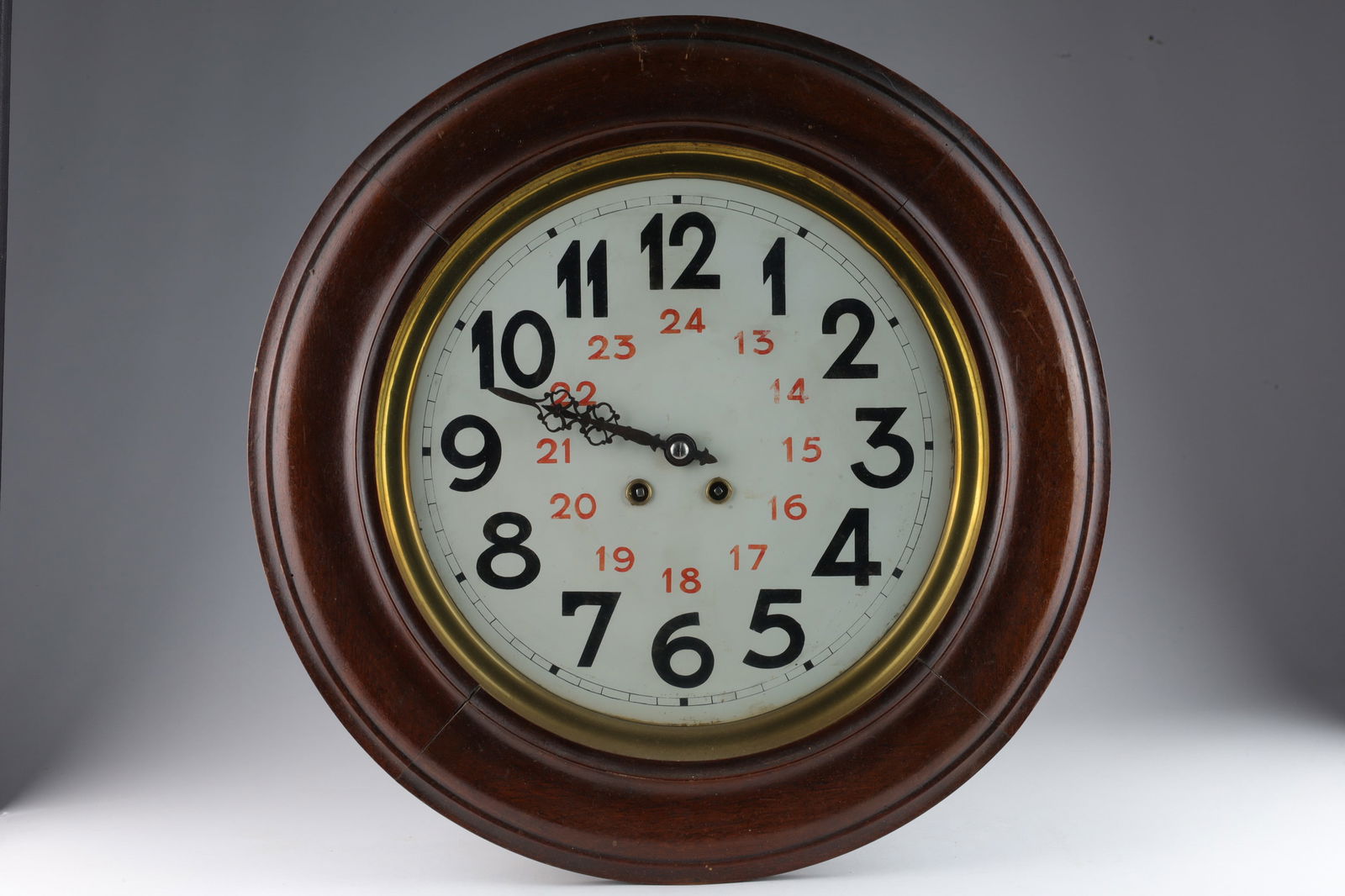 1900s Art Deco 24H Pendulum Station Wall Clock: 1900s Art Deco 24H Pendulum Station Wall Clock in Wood Case with painted dial and red PM painted numbers. Functioning, but servicing is recommended. Dial measures 12.5 inches diameter, clock measures