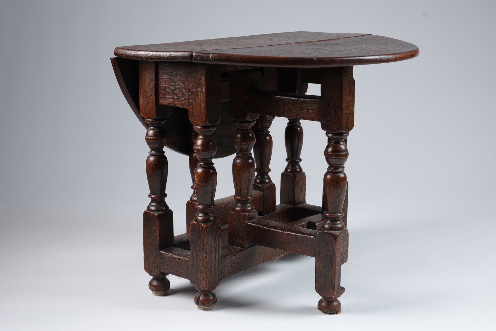 Small Antique Oak Georgian Gateleg Low Table: Small Antique Oak Georgian Gateleg Low Side Table. 24 inches W x 18 H x 9 W, closed. 26 inches fully opened.