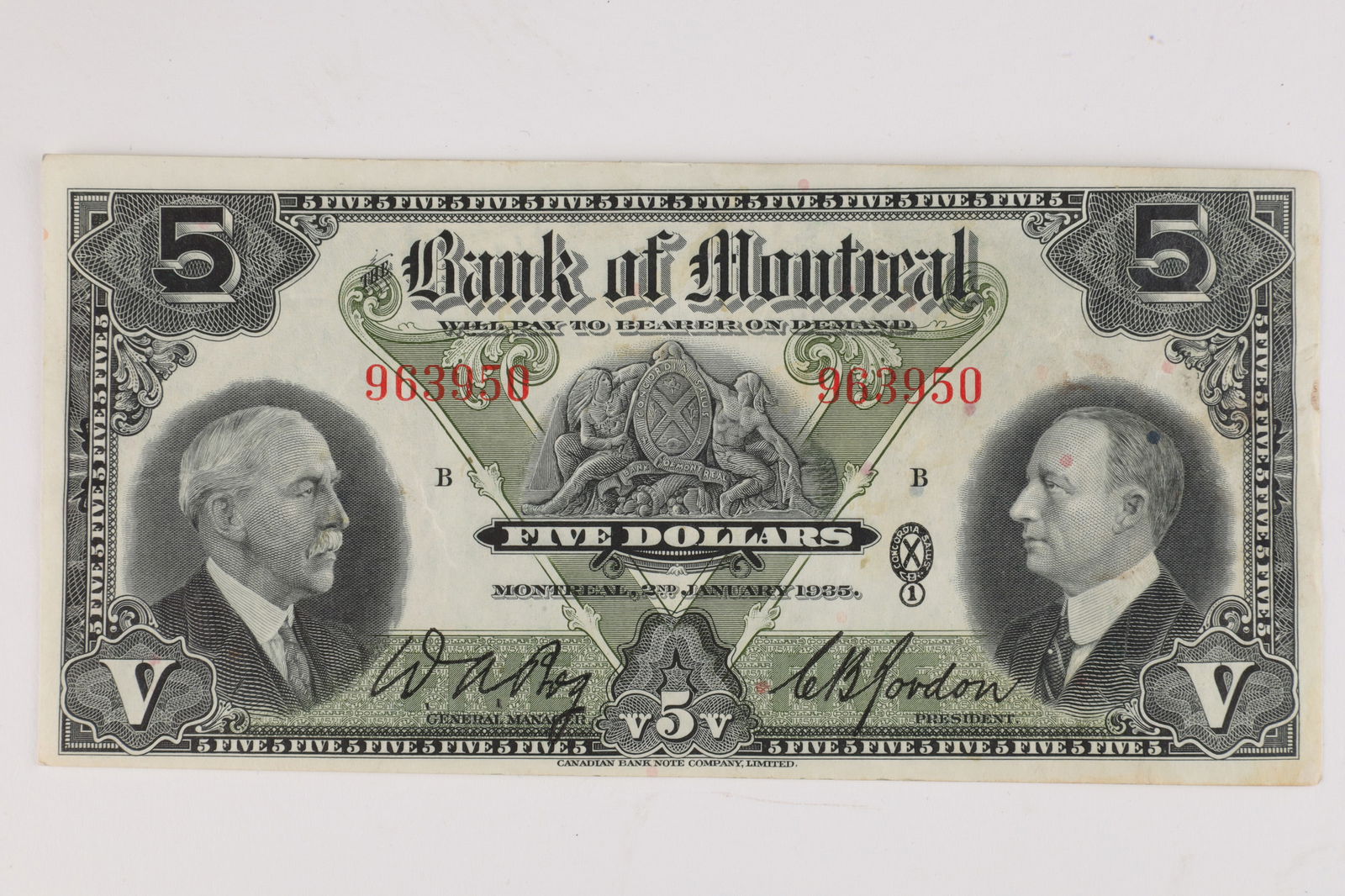 Bank of Montreal Canada Five 5 Dollar Bill Note: Bank of Montreal Canada five 5 dollar bill bank note, appears about uncirculated, dated 2 January 1935, signed W.A. Bog and C.B. Gordon, serial number 963950. 2.75 inches H x 5.75 W.