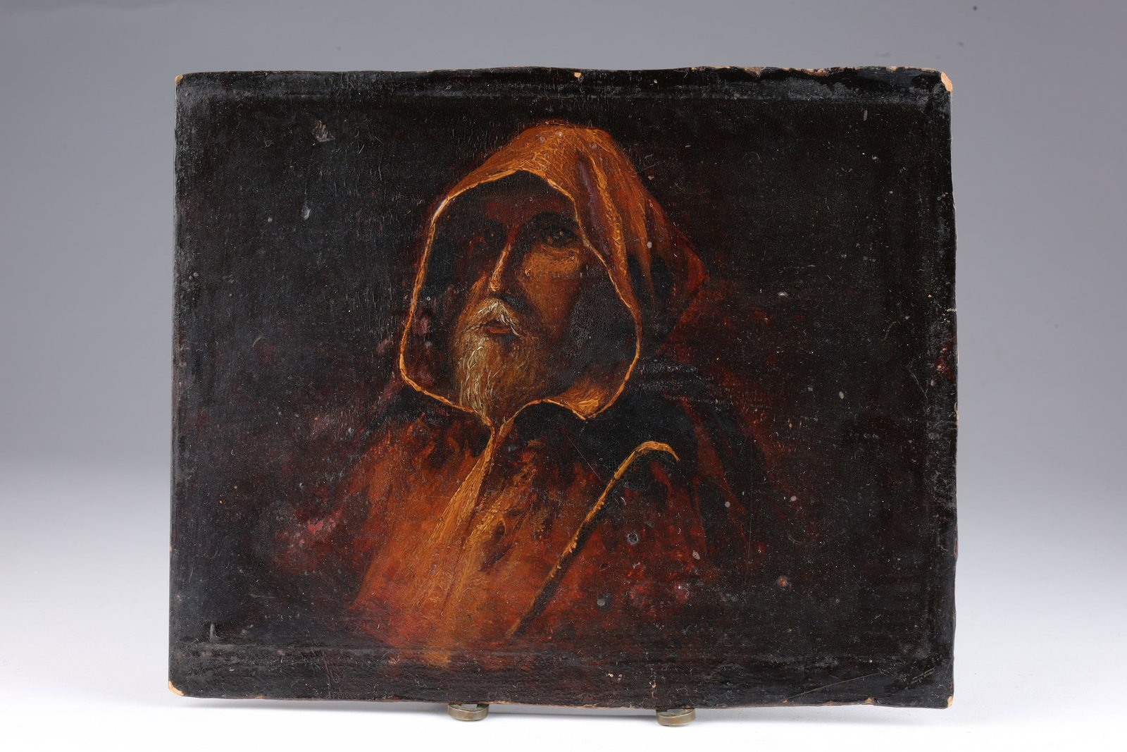 Antique Unsigned Portrait of a Man in Cloak / Monk: Antique Unsigned Oil on Board Portrait of a Man in Cloak / Monk in Darkness. 6.5 inches H x 8.25 W.