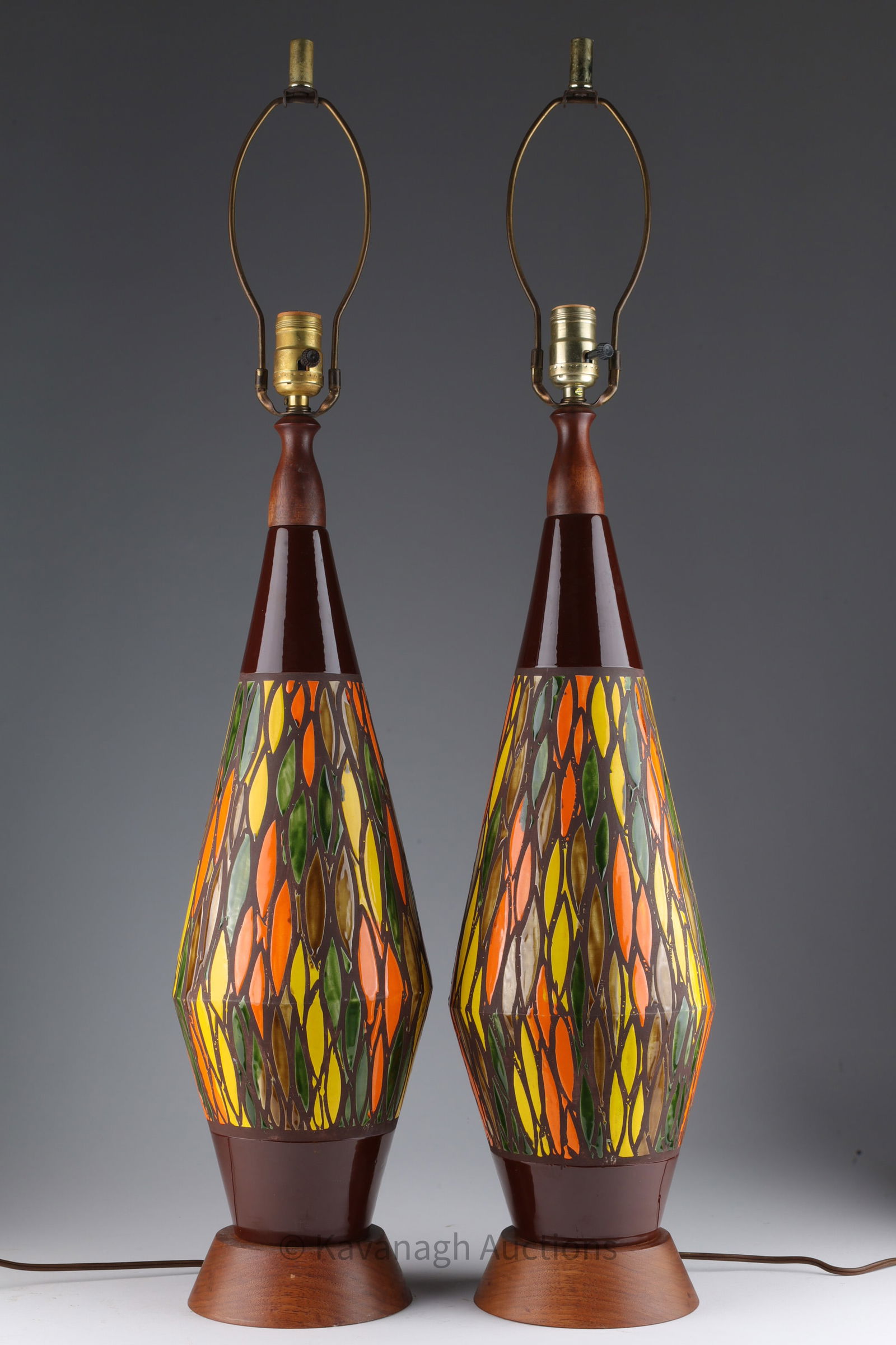 Pair of Mid Century Bitossi Ceramic Table Lamps: Pair of Mid Century Bitossi Ceramic Table Lamps with Teak Bases. 35 inches H including harps.