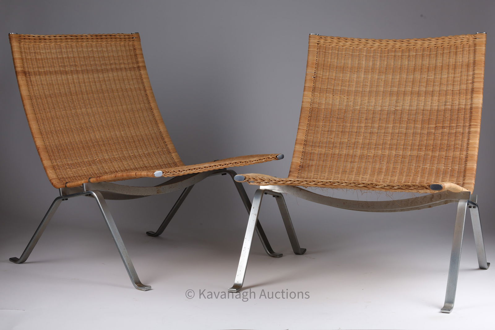 Pair Poul Kjaerholm PK-22 E. Kold Christensen Steel and Cane Lounge Chairs (1 of 9)