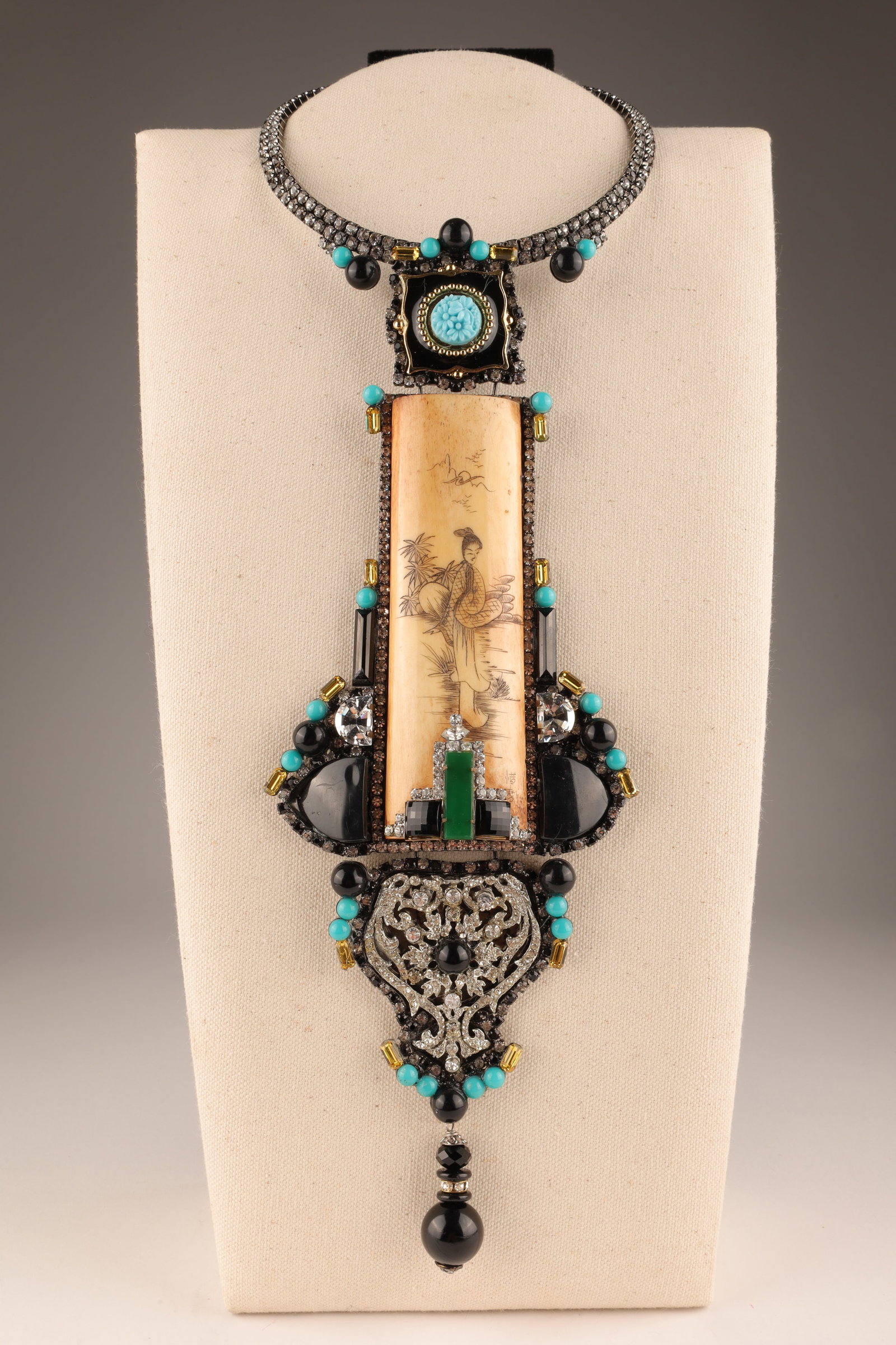 Lawrence Vrba Chinese Carved Bone Choker Necklace: Lawrence (Larry) Vrba Chinese Carved Bone Choker Necklace. Carved bone centrepiece depicting a female figure in a landscape (signed) surrounded by rhinestones, turquoise coloured round beads and bague