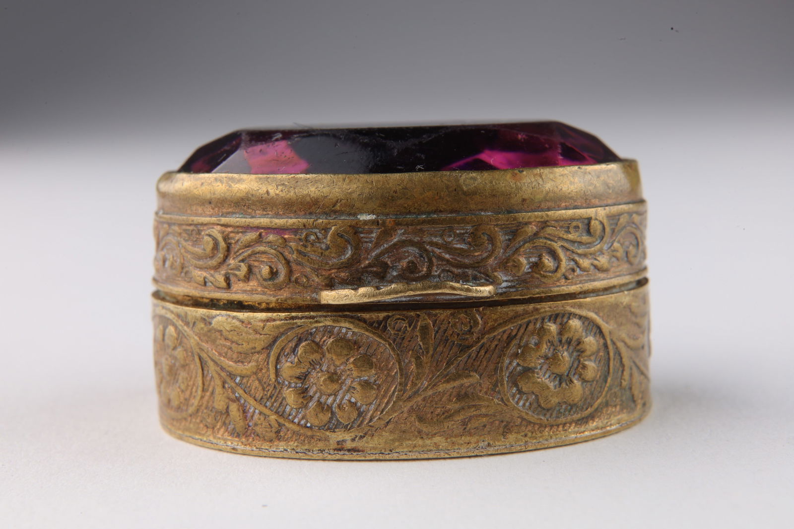 Italian Art Nouveau Brass Faceted Glass Pill Box: Italian Art Nouveau Brass Faceted Glass Pill Box. Marked Italy on underside. 1.25 x 1 x 0.75 inches H.