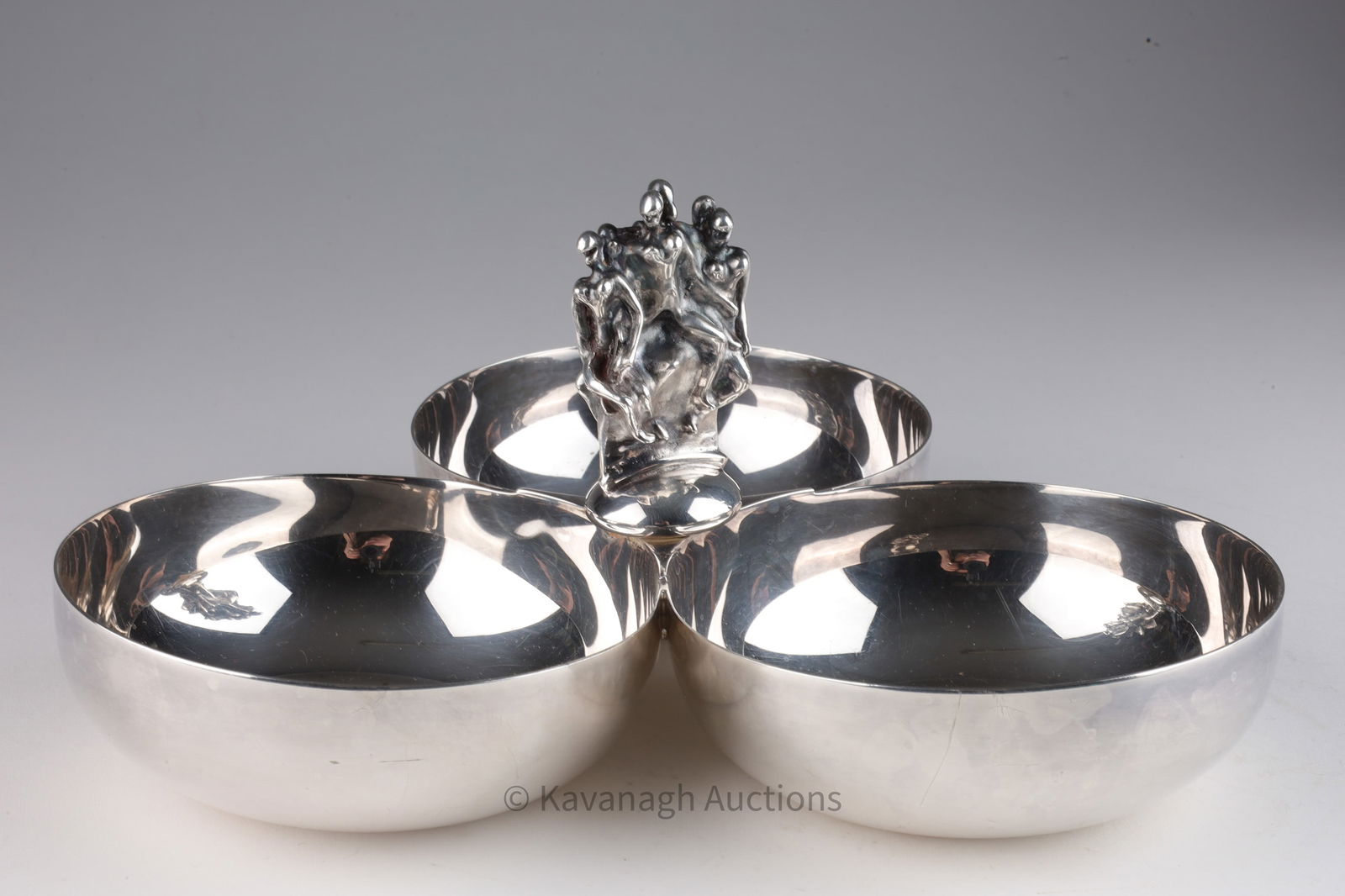 Christofle French Jean Filhos Clover Dish Bowls: French silver plate clover shaped dish with the handle showing a sculpture by Jean Filhos (1921 - 2002) of a group of nude human forms, manufactured by Orfevrerie Christofle of Paris, France, marked o