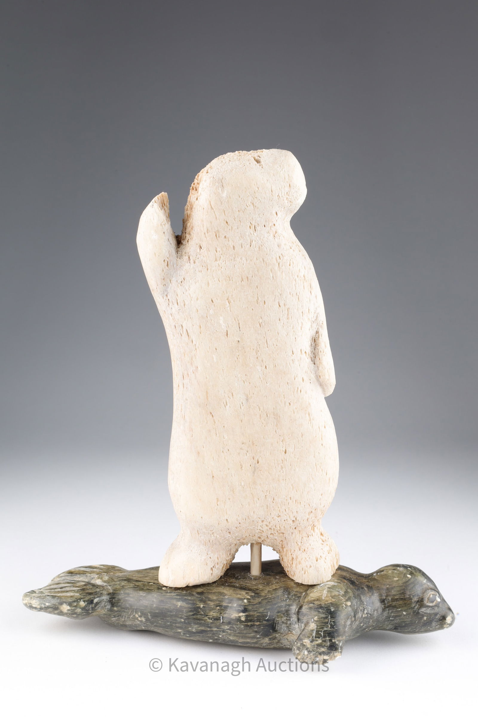 Inuit Carving Bone / Soapstone Seal Transformation: Inuit Carving Whale Bone and Soapstone Seal on Seal Transformation, 1960s. This item cannot be exported from Canada. 9 inches H x 8 W x 4 deep.