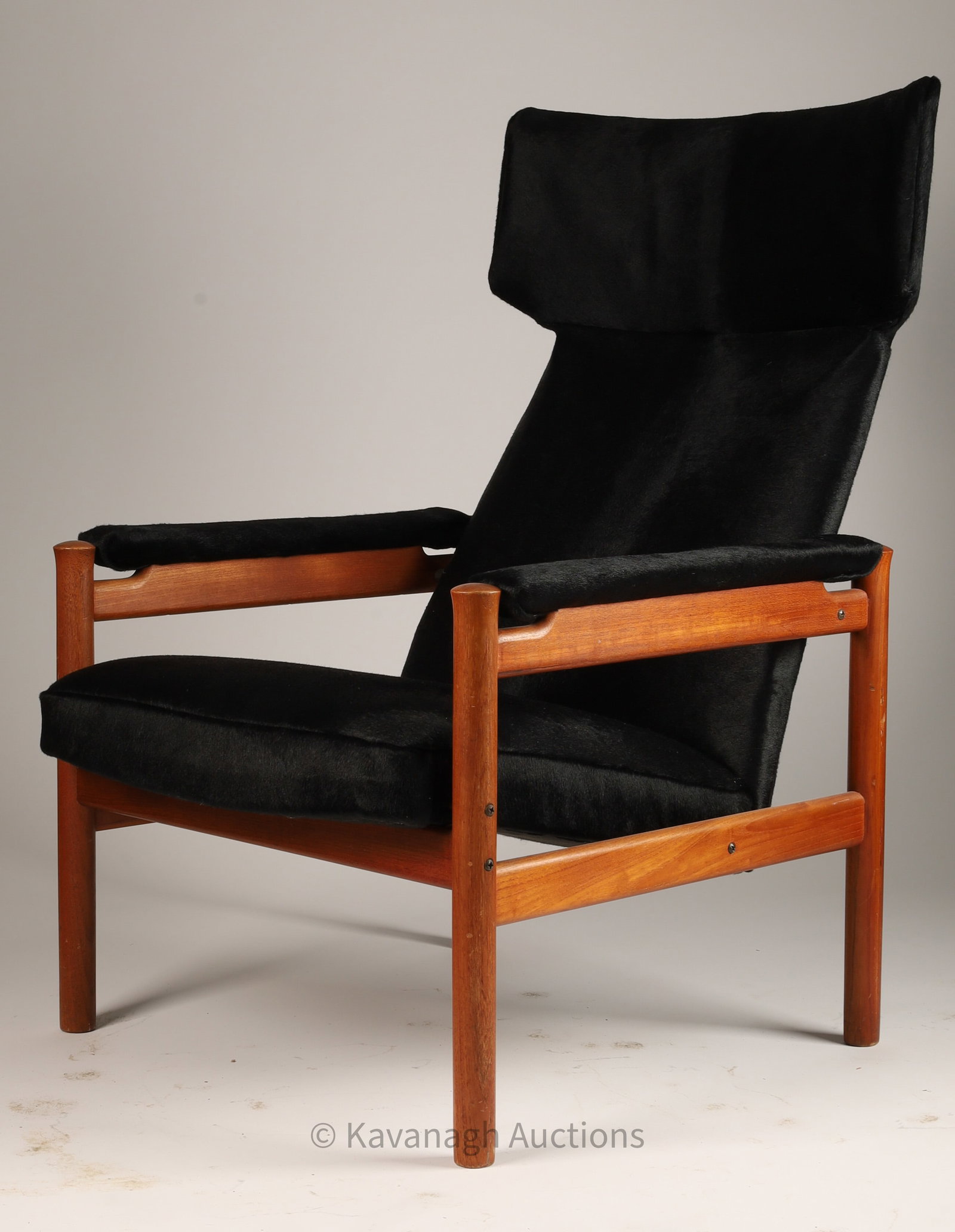 MCM Soren Hansen Wingback Lounge Chair Black Hide: Mid Century Modern Denmark Soren Hansen for Fritz Hansen, model 4365 wingback chair, in teak and black cowhide upholstery. 40 inches H x 27.75 W x 33.5 deep, seat height 16 inches.