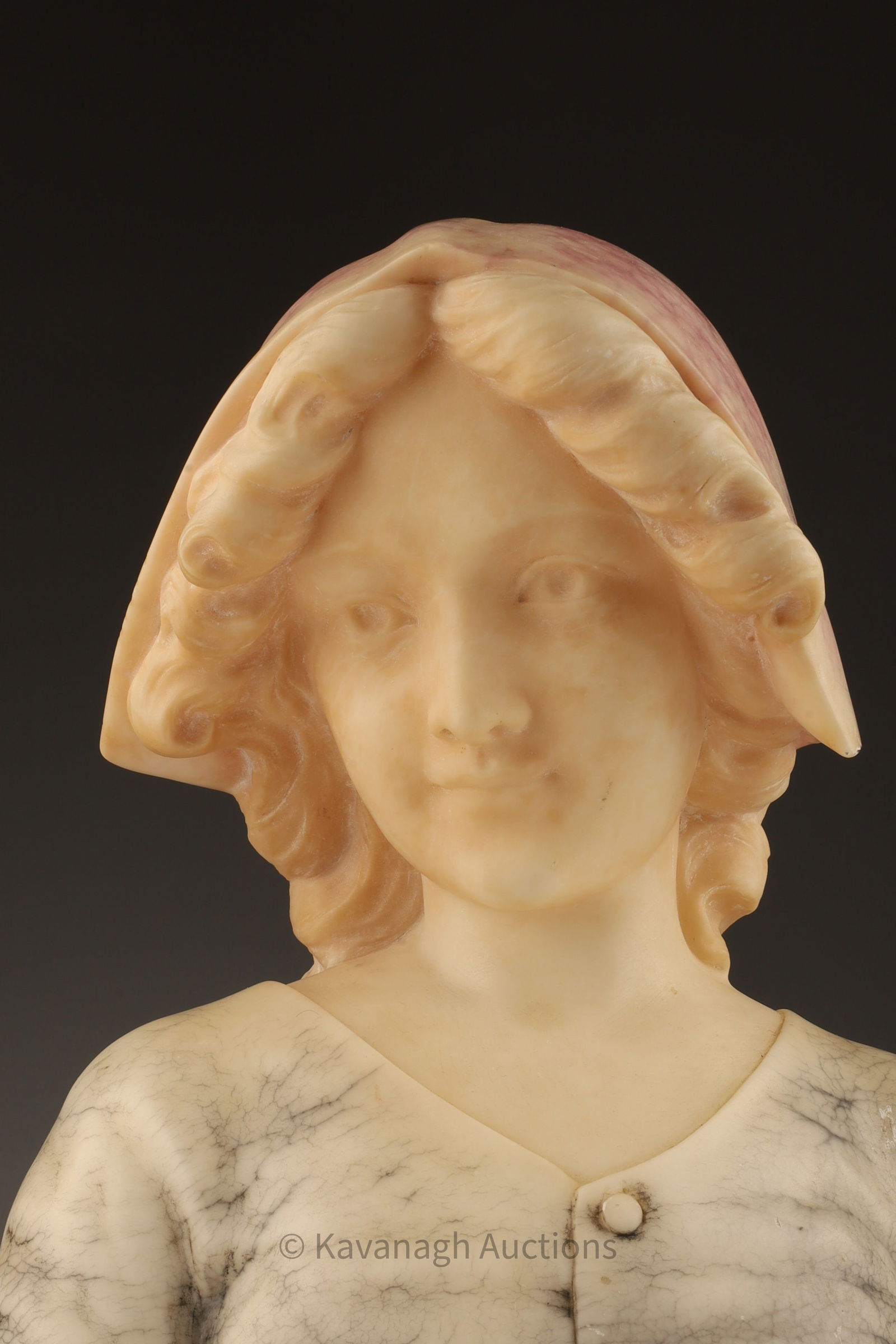 Antique Alabaster Bust Young Woman with Cap: Antique Carved and Dyed Alabaster Bust of a Young Woman wearing a bonnet or cap. 11 inches H x 8 W x 4 deep.