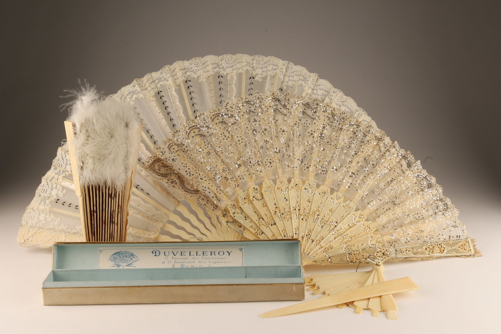 Collection of Antique French Lace Fans: Collection of 3 Antique French Lace Fans, one needs restoration. Largest fan measures 15 inches L. Lace fan with pique work has some repairs, comes in old box.