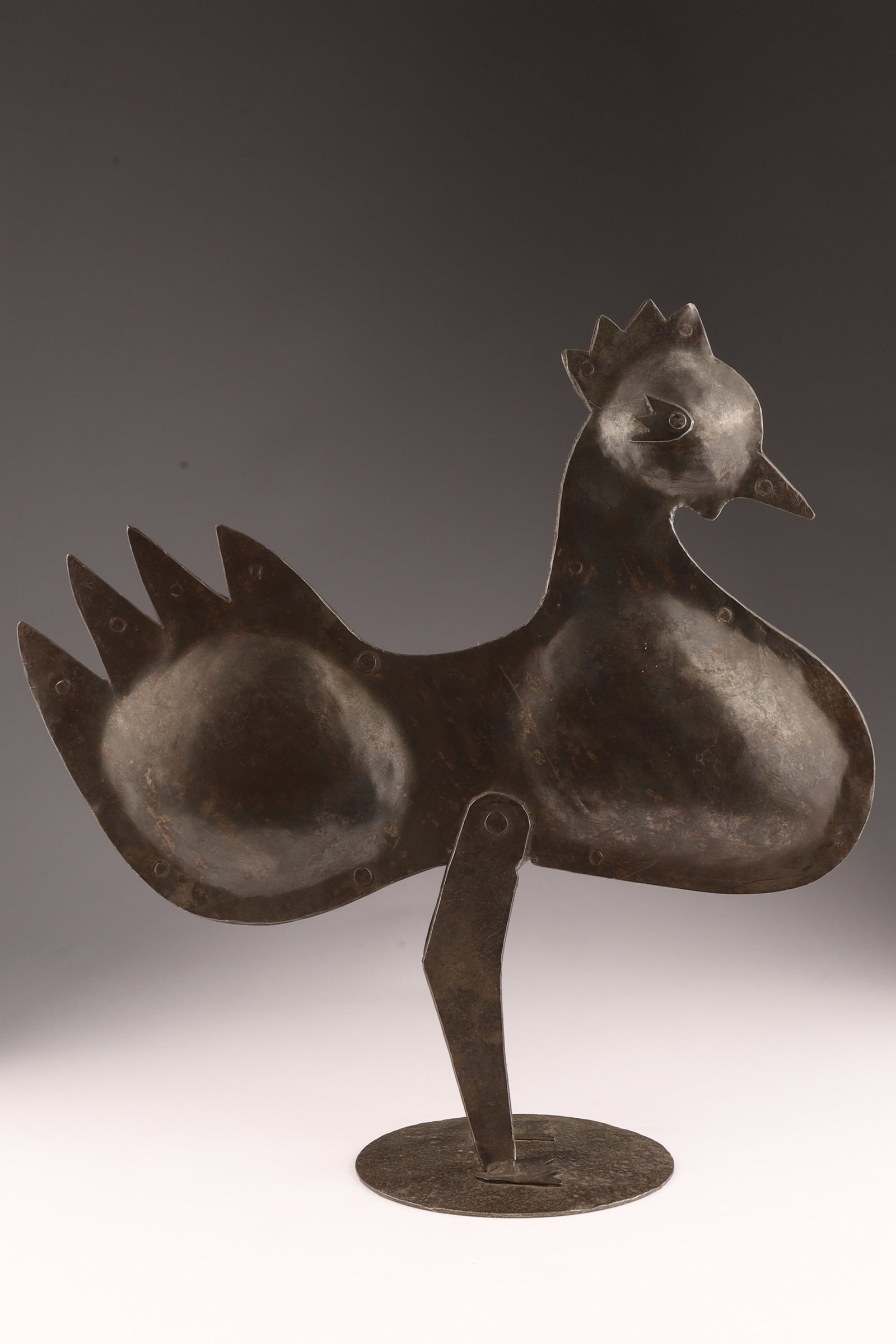 Brutalist Black Riveted Iron Rooster Sculpture: Brutalist Black Riveted Iron Rooster Sculpture. 12.5 inches H x 12 W.