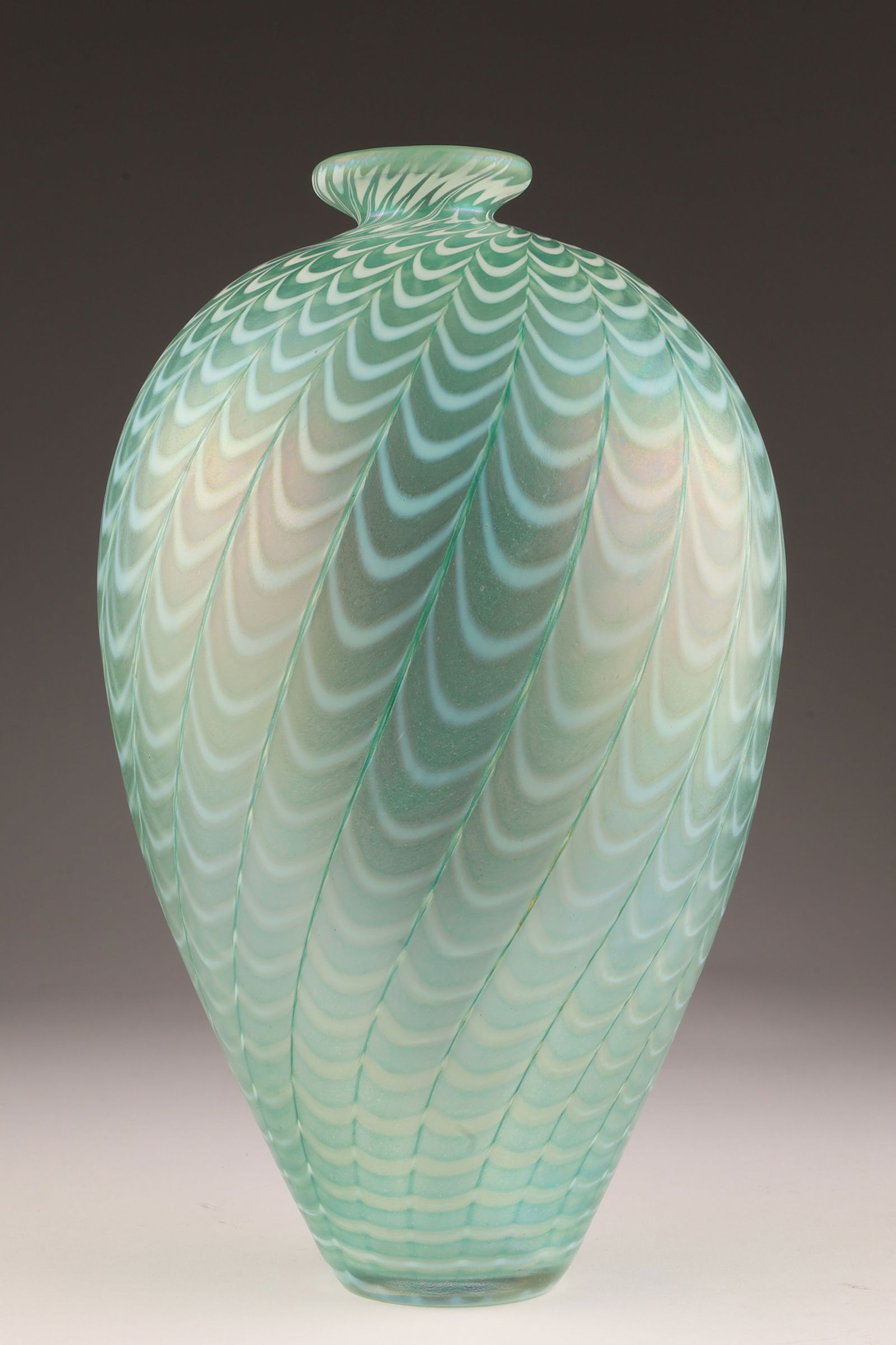 Signed Bertil Vallien for Kosta Boda Minos Vase: Signed Bertil Vallien for Kosta Boda Minos Swirled and Feathered Iridescent Vase. 10 inches H x 5.5 W.