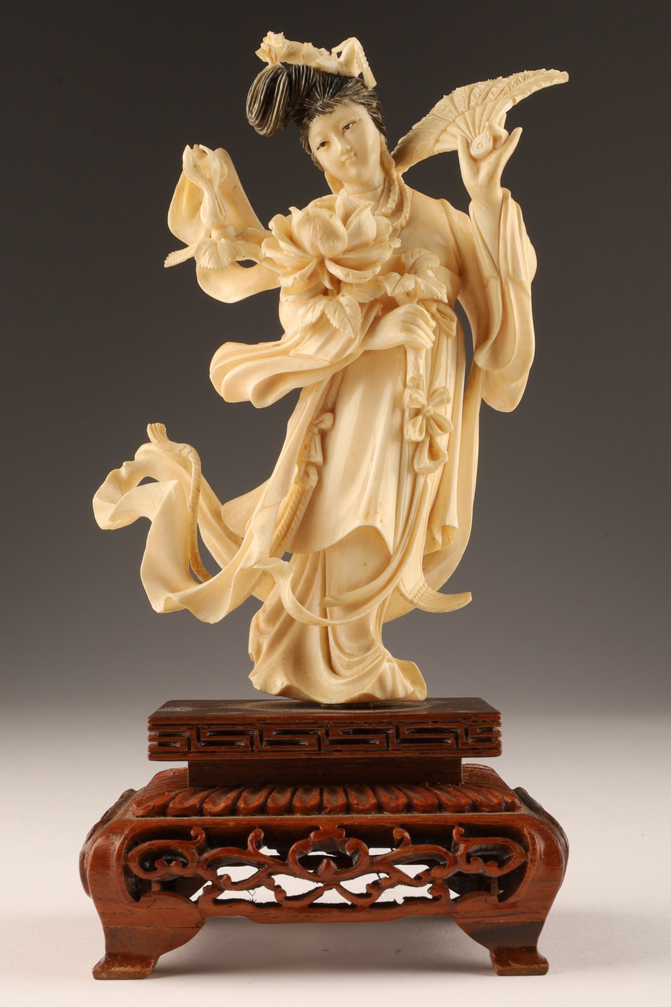 Chinese Japanese Carved Female with Fan Figurine: Chinese Japanese Carved Female Geisha with Fan Figurine. 7 inches H x 3.5 W x 3 deep with wood base, figure stands 5 inches H.