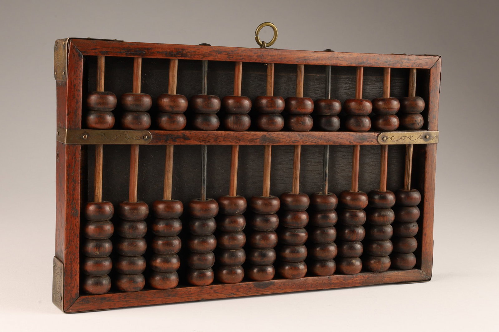 Antique Chinese Hardwood and Brass Abacus: Antique Chinese Hardwood and Brass Abacus. Repair to right middle register under brass hinge. 72 beads. 11 inches W x 6.5 H.