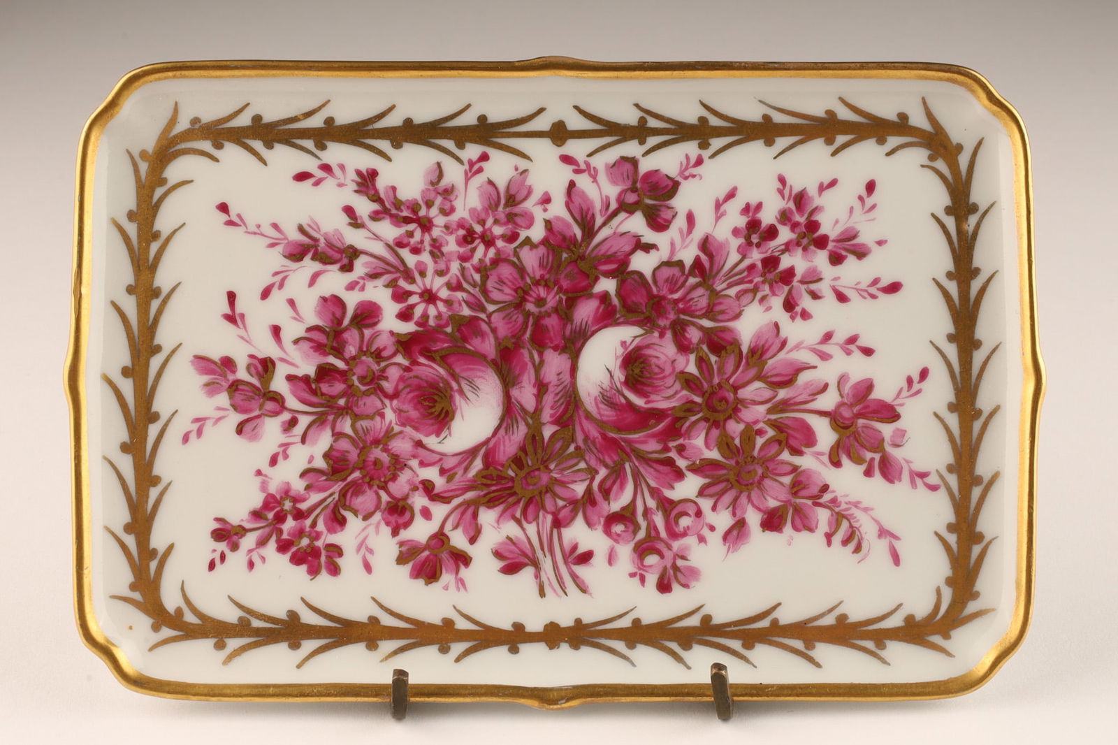 Sevres Limoges Porcelain Painted Vide Poche Tray: Sevres Limoges Porcelain Painted Vide Poche Tray. Hand painted floral bouquet with gilt decoration. Signed on verso, Decor Sevres Fait Main M. Carpezat Limoges France. 6.75 x 4.5 inches.