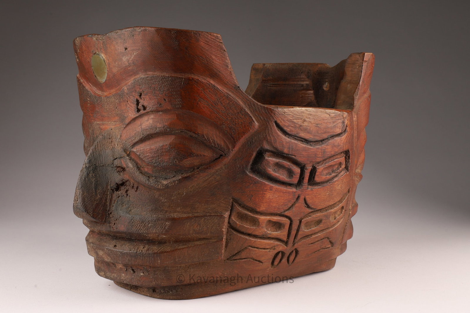 Northwest Coast Shaped Carved Faces Bowl: Northwest Coast Shaped Carved Faces / Masks Bowl. 7 inches H x 10 L x 7 deep.