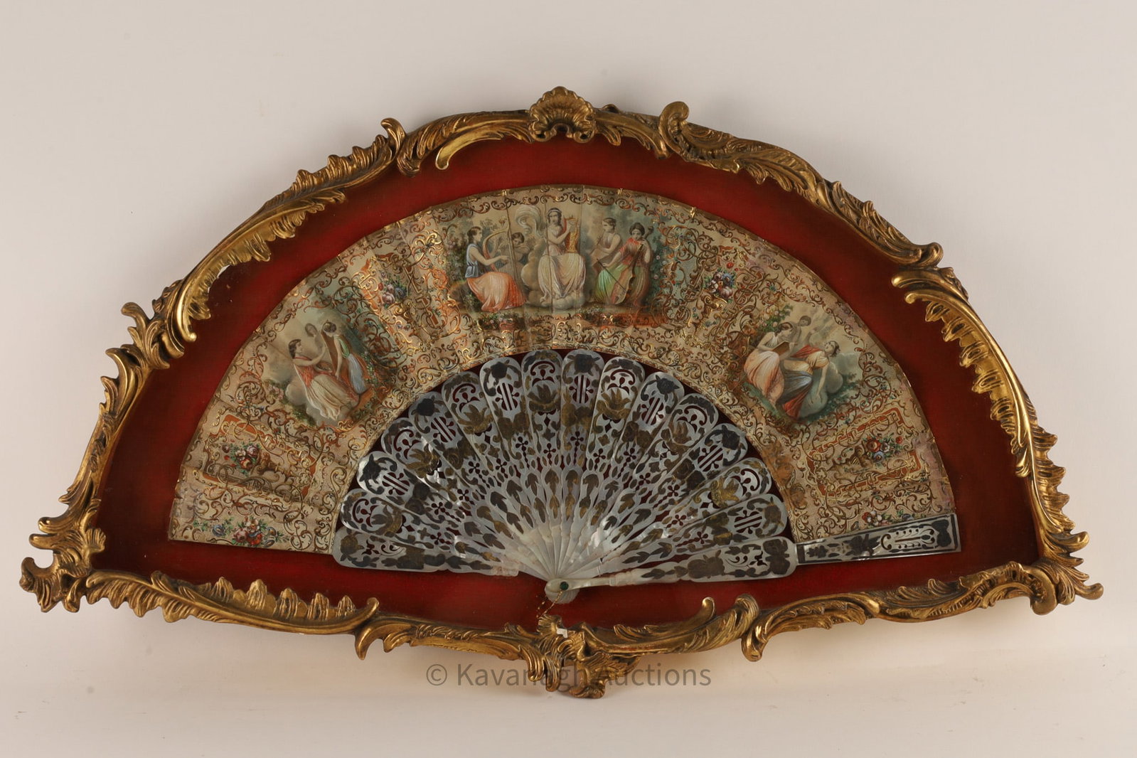 French Empire Painted Fan Neoclassical Women: French Empire period fan set in acanthus scroll bordered case (frame), the leaf of the fan with hand painted romantic scenes set in cartouche of neoclassical woman, the carved and cut mother-of-pearl 
