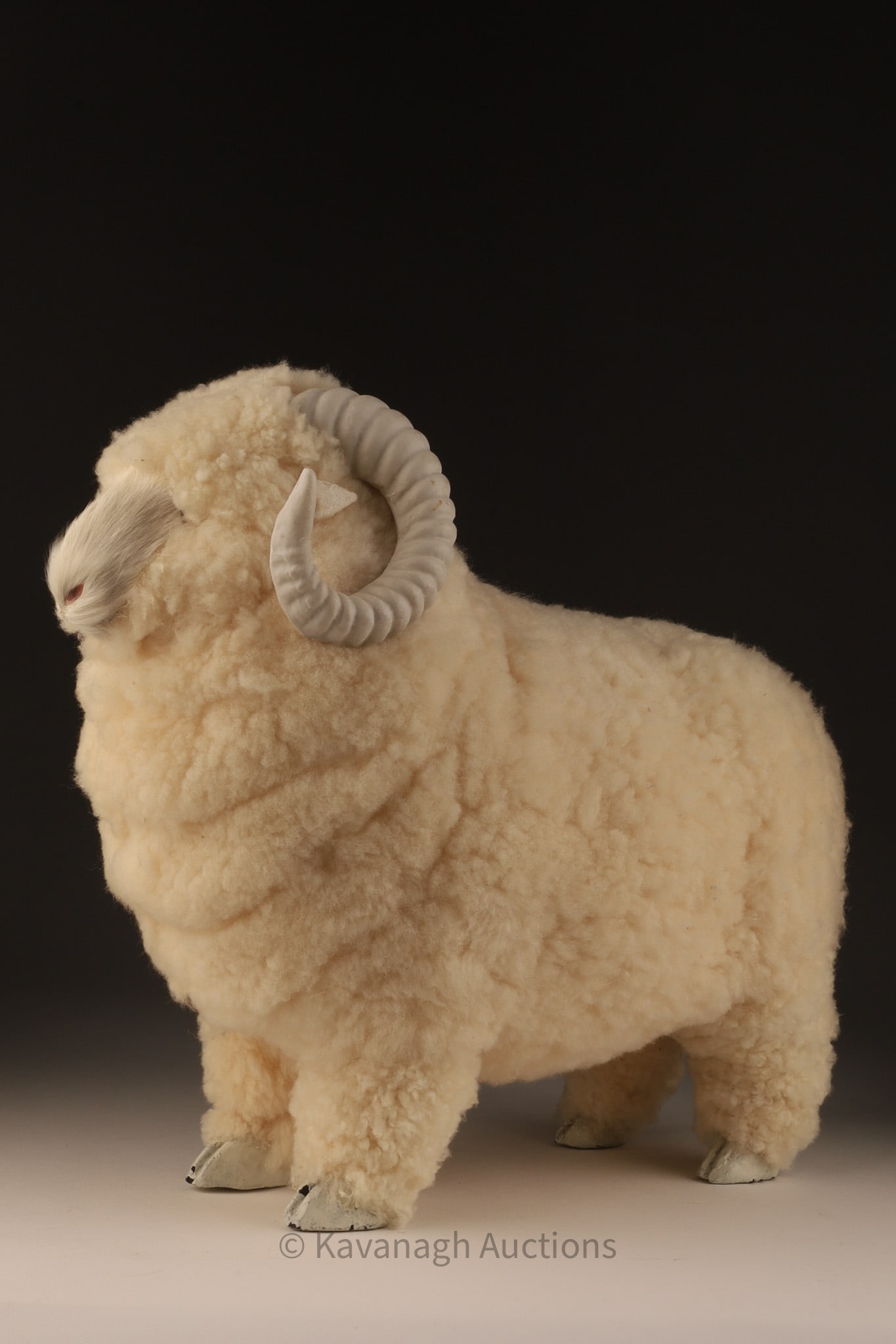 Francois Xavier Lalanne Style Figure of a Sheep: Composite and sheepskin vintage sheep in the style of Francois Xavier Lalanne. Glass eyes and painted horns and hooves. 10.5 inches H x 16 L