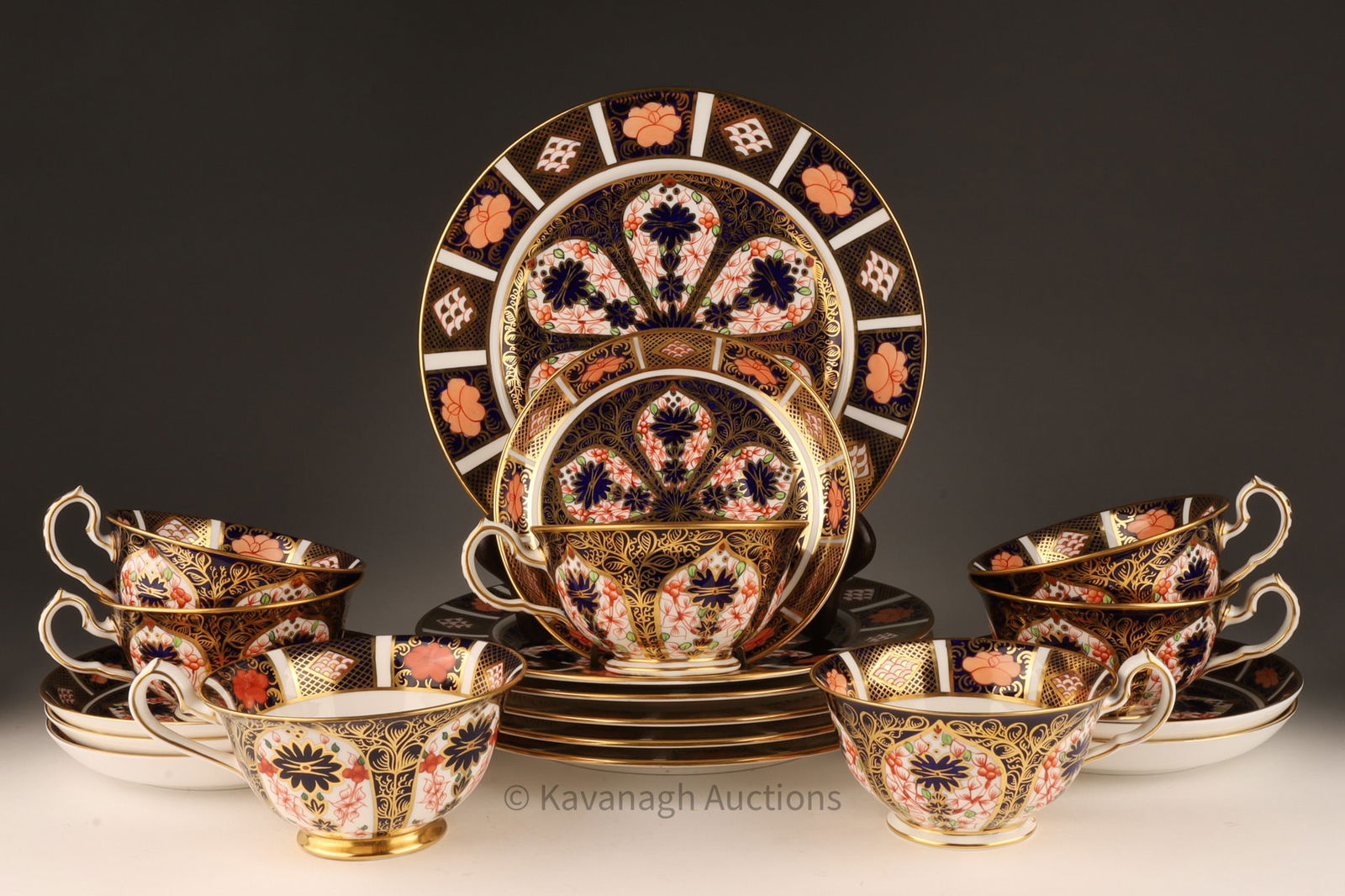 Royal Crown Derby Old Imari Dessert Set 1911: English antique white bone china set of six dessert plates (8 inches diameter) and 6 teacups (4.75 inches L x 2.25 H) and saucers (5.75 inches diameter) in the Old Imari pattern by Royal Crown Derby,