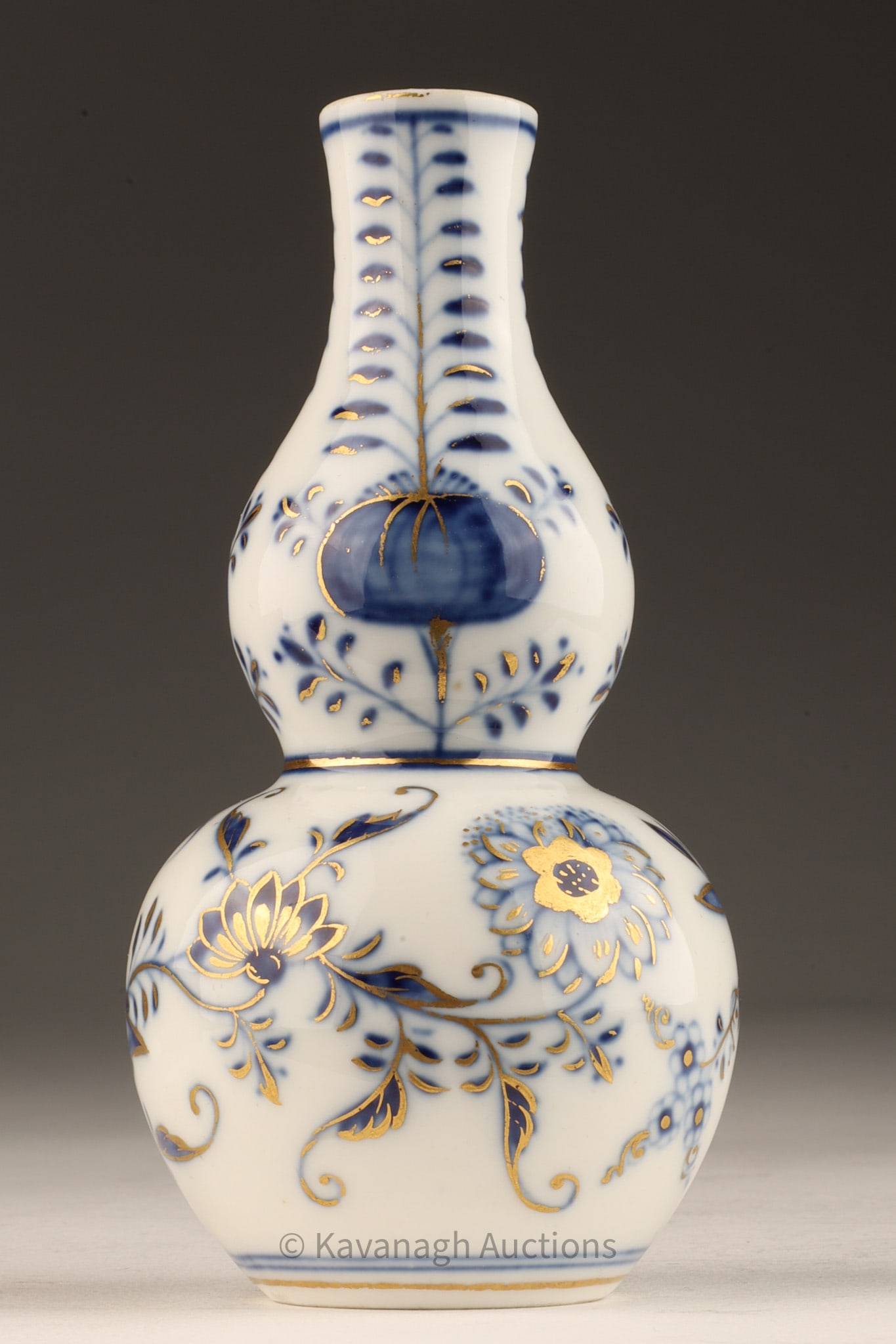 Antique Meissen Blue Onion Double Gourd Vase: Antique Meissen Blue Onion Double Gourd Vase with gilt overpainting. Marked on base. 5 inches.