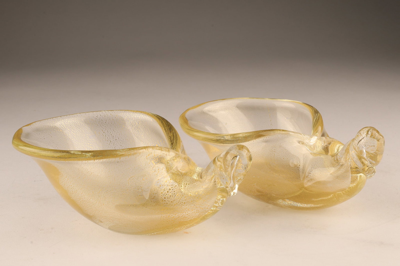 Pair Seguso Murano Gold Flake Cornucopia Bowls: Pair of Seguso Murano Hand Blown Gold Flake Cornucopia Bowls. 5 inches L x 4 W x 2 H.