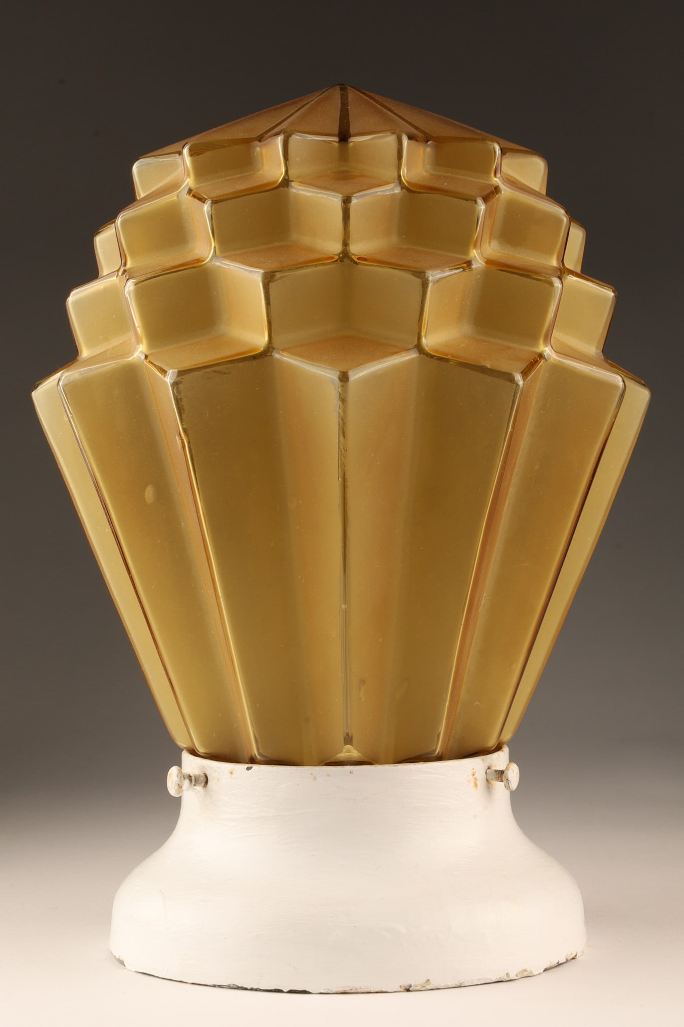 Art Deco Amber Glass Skyscraper Globe Fixture: Art Deco Amber Glass Skyscraper Globe Ceiling Fixture. Globe measures 9.5 inches H x 7 W, 12 inches H with cup.