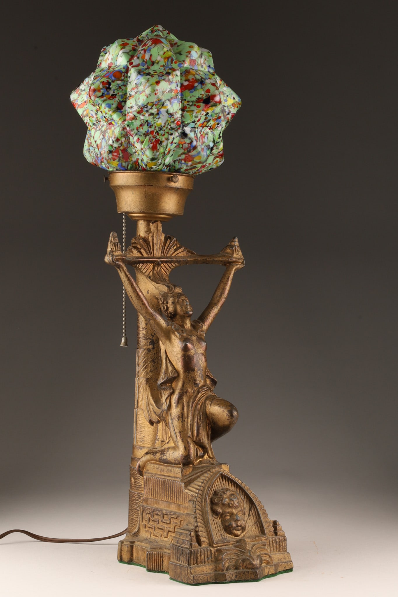 Art Deco Egyptian Revival Lamp Starburst Globe: Art Deco Egyptian Revival Patinated Spelter Lamp with End Of Day Starburst Glass Globe. 15.5 H x 6.5 W x 7.5 inches deep, 21 inches H with shade.