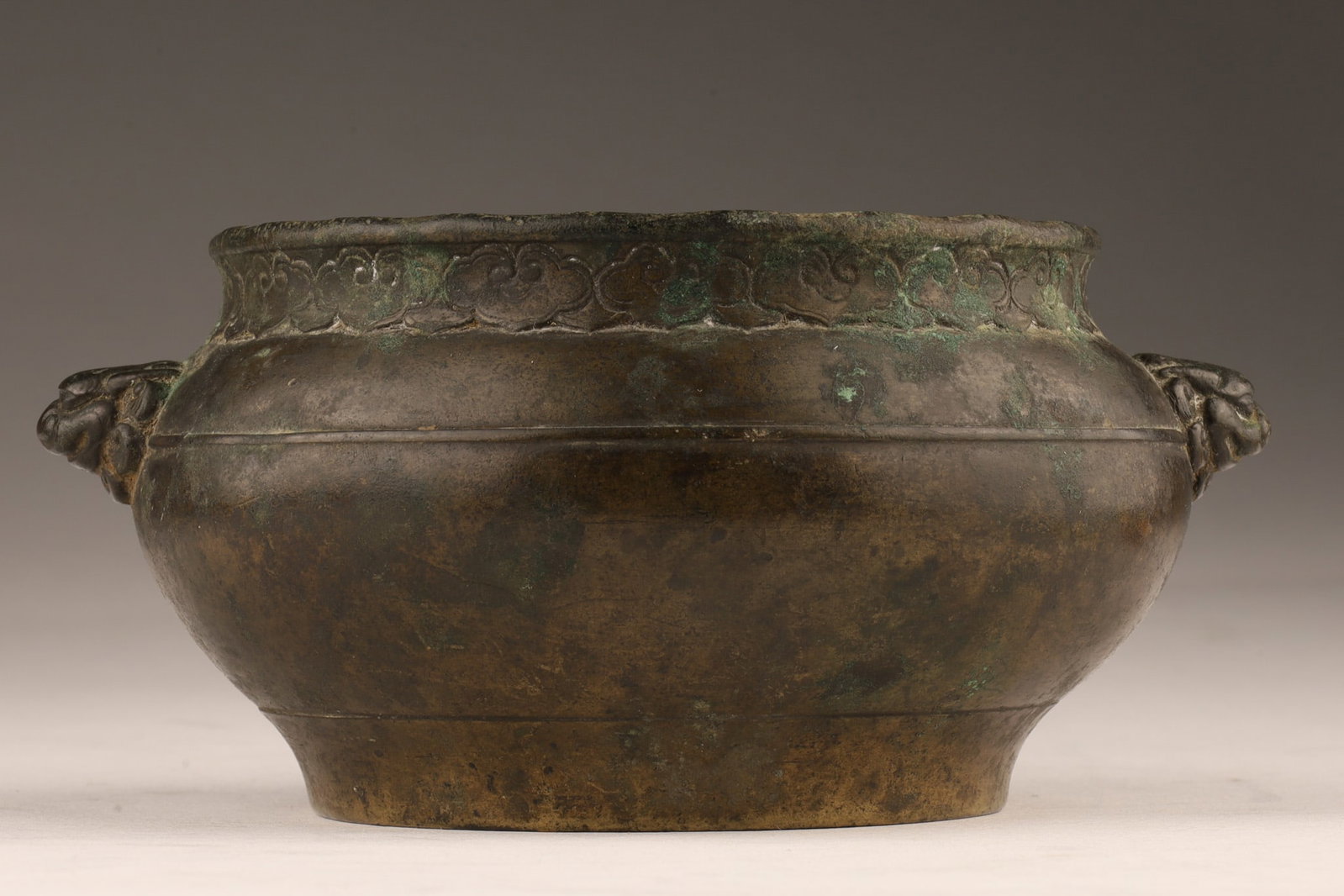 Antique Chinese Bronze Incense Burner Censer: Antique Chinese Bronze Incense Burner Censer decorated with clouds, beast masks and marked on base with drawing of a mythical beast. Wax export seal on base, 5 inches diameter x 2.5 H.