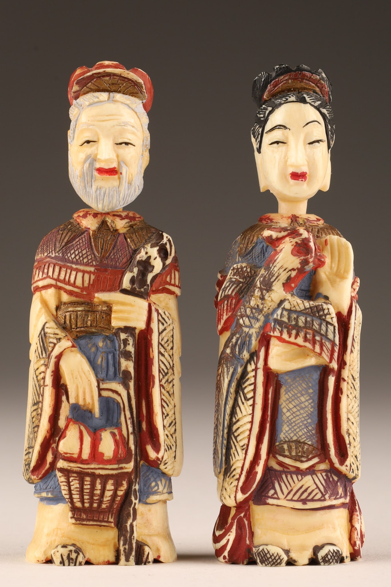 Pair Chinese Carved Emperor Empress Snuff Bottles: Pair Chinese Carved Emperor and Empress Snuff Bottles. 3 inches H, this lot cannot be exported from Canada.