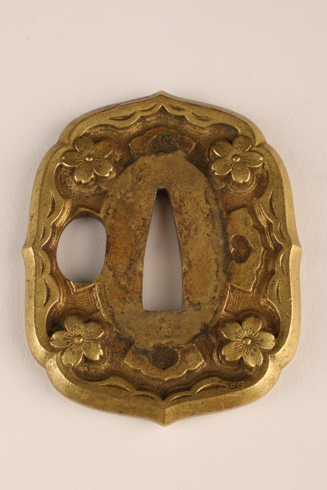 Japanese Imperial Gunto WW1-WW2 Military Tsuba: Nice imperial Japanese tsuba for Sword Type 98 Shin Gunto sword. All brass with usual Sakura cherry blossom. Circa first half of 20th century. No box. 2.75 inches H x 2.25 W.