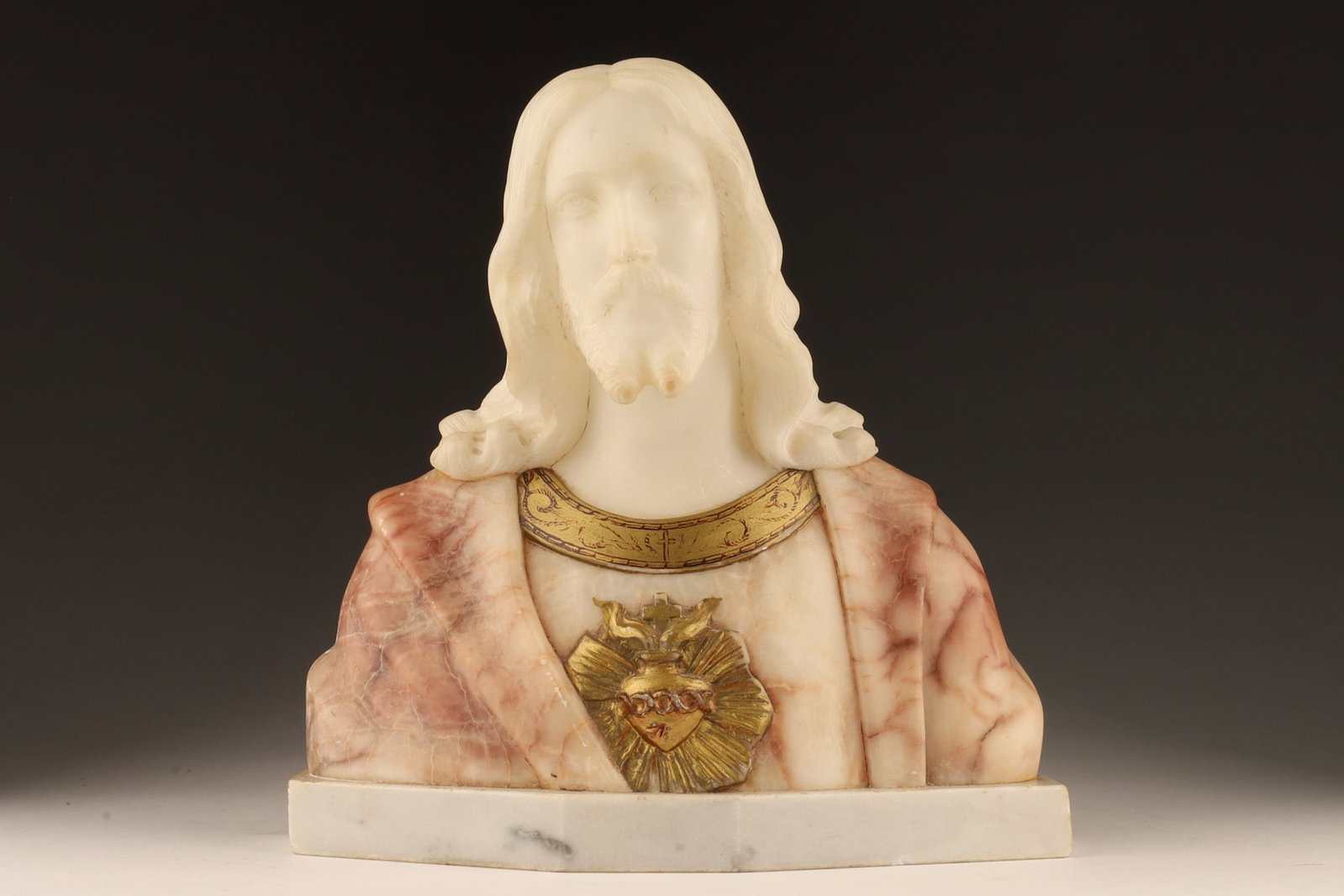 Antique Italian Marble Bust Sacred Heart of Jesus: Antique Italian School Colored Marble Bust of The Sacred Heart of Jesus Sculpture with gilt highlights. 8.5 inches H x 8 W x 4 deep.