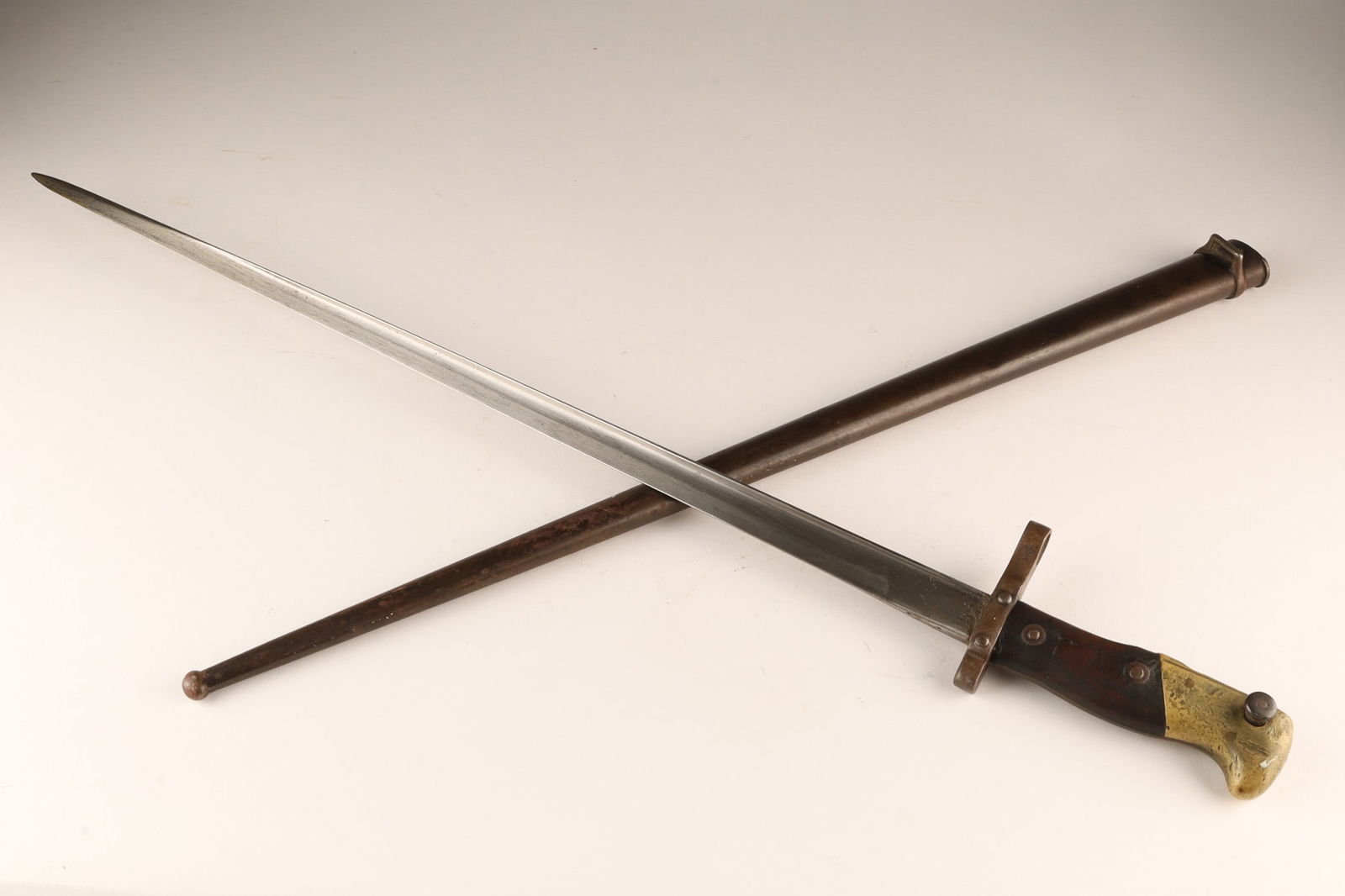 1875 French Military Gras Rifle Bayonet Scabbard: Antique 1875 French Military Gras Rifle Bayonet Dagger Sword w/ Scabbard. Marked along blade, hallmarked on ricasso, S in lozenge, M in circle. 26 inches L, blade measures 20.5 inches.