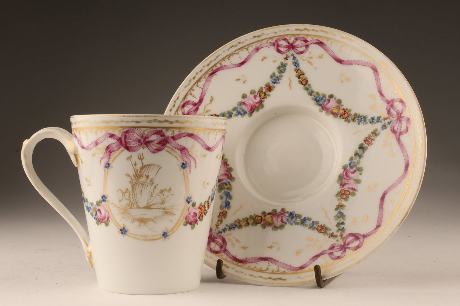18th C French Marie Antoinette Teacup Saucer: Rare 18th C Teacup and Saucer Marie Antoinette Pattern, Porcelaine de Paris by Manufacture de la Reine Rue Thiroux a Paris. Saucer measures 6.25 inches diameter, marked with red A under crown.
