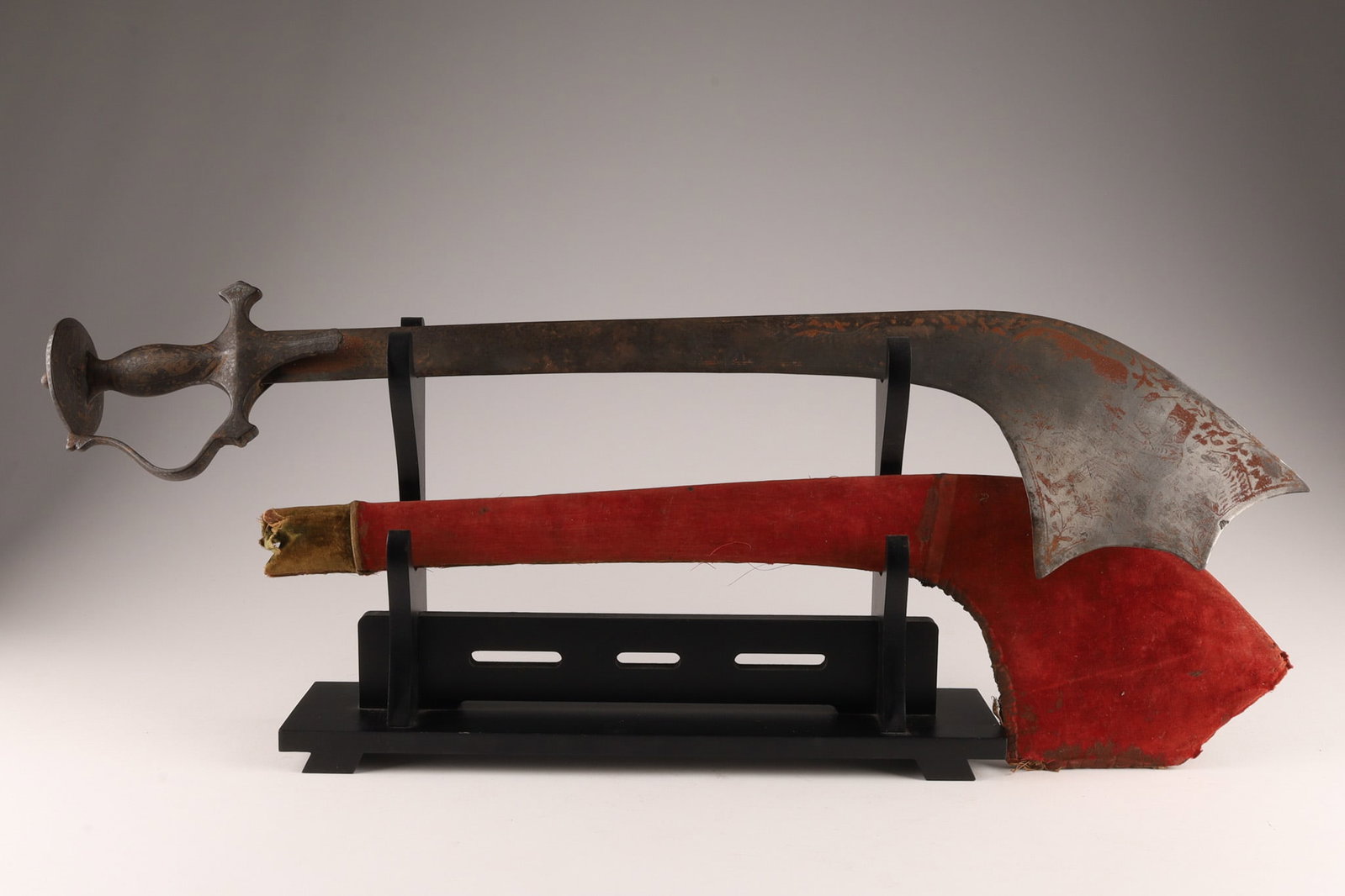 Indian Kora Sword With Inlaid Silver Tulwar Hilt: Indian Kora Sword With Inlaid Silver Tulwar Hilt and old velvet scabbard. Scabbard is split. Sword measures 27 inches L, blade measures 22 inches L x 6 W.