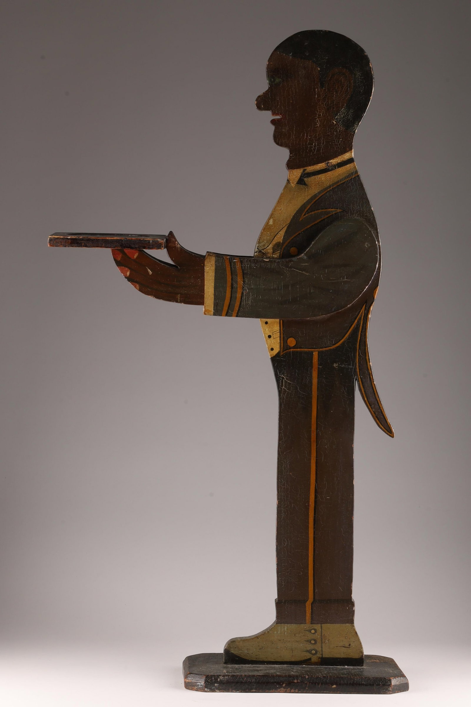 Black Americana Silent Butler Smoking Stand: Folk Art Painted Black Americana Silent Butler Smoking Stand. 34.5 inches H x 19 W x 7 deep. Chip to coat tails.