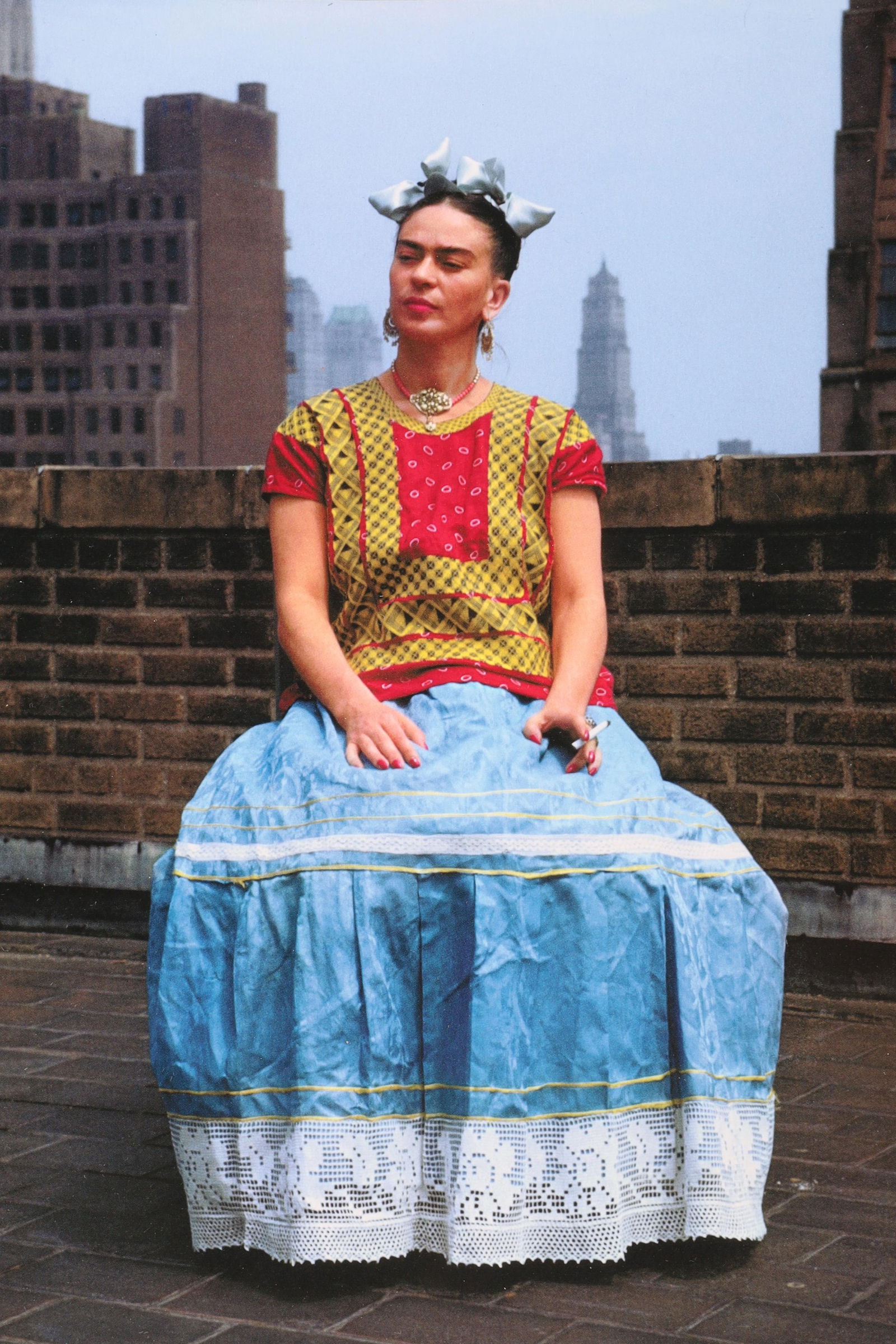 Nickolas MURAY photograph of Frida Kahlo: Nickolas Muray (Hungarian born American, 1892 - 1965) photograph of Frida Kahlo on rooftop, New York 1946. Archival Print, printed in Belgium - Snoeck Ducaju and Zoon - Gent Belgium. Measures 9.5 inch