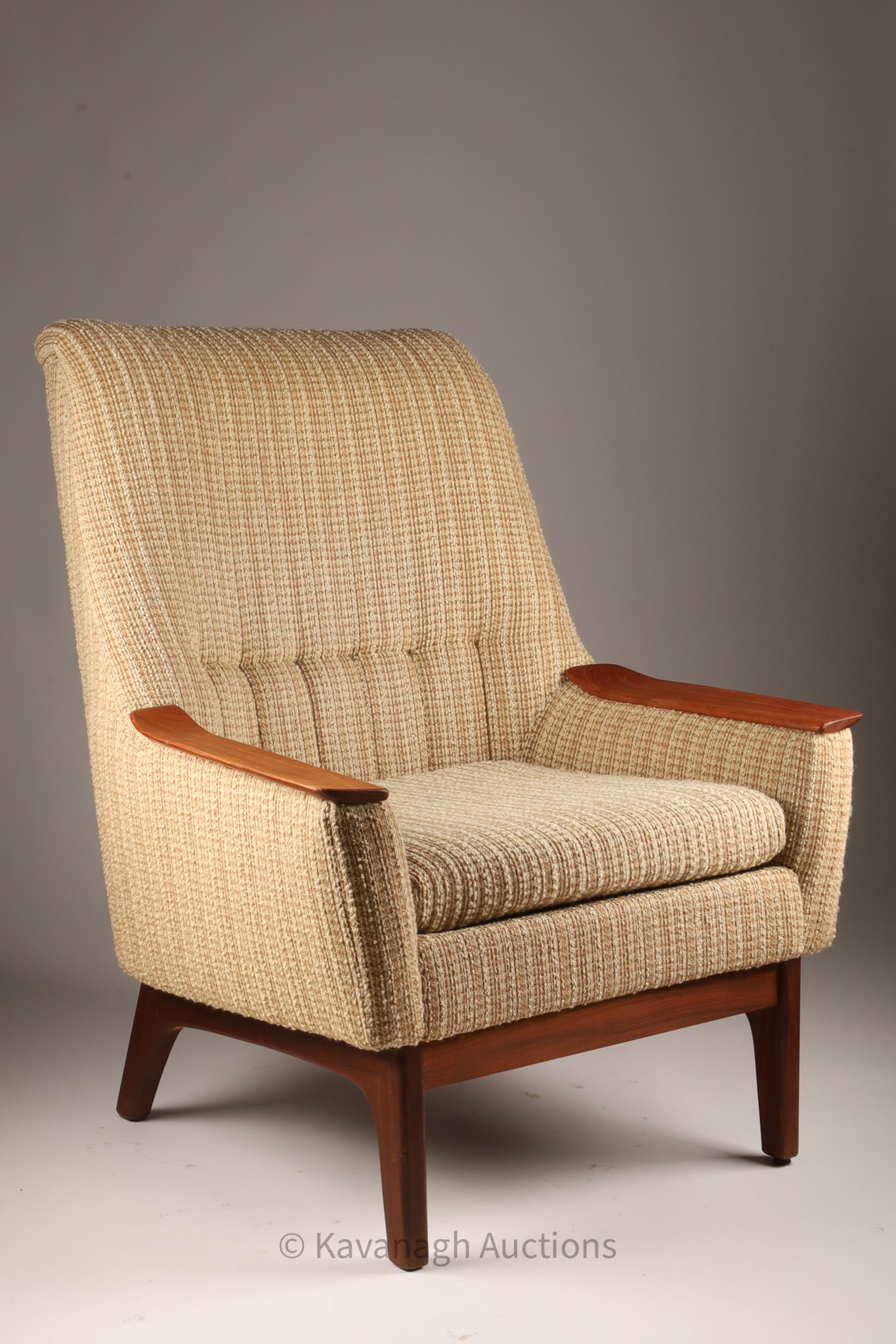 Mid Century Upholstered Teak Lounge Armchair: Mid Century Upholstered Teak Lounge Armchair with teak paws / arm rests. Measures 40 inches H x 31 W x 26 deep, seat height 17 inches.
