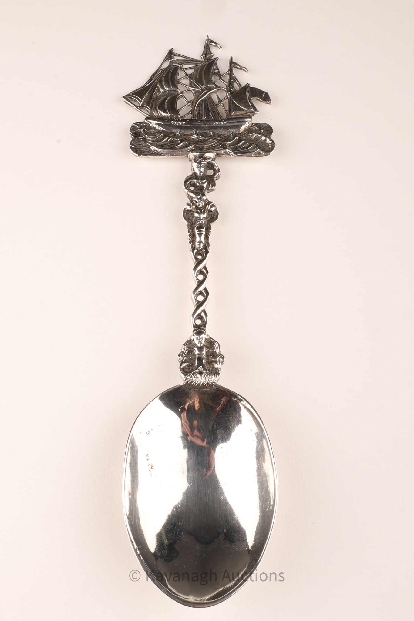 Large Ornate Antique Hanau Galleon Serving Spoon: Large Ornate Antique Hanau Ship / Galleon Serving Spoon decorated with waves, dolphins and other mythical sea creatures. 69 grams total weight, Hanau hallmarked on spoon. 8 inches L.