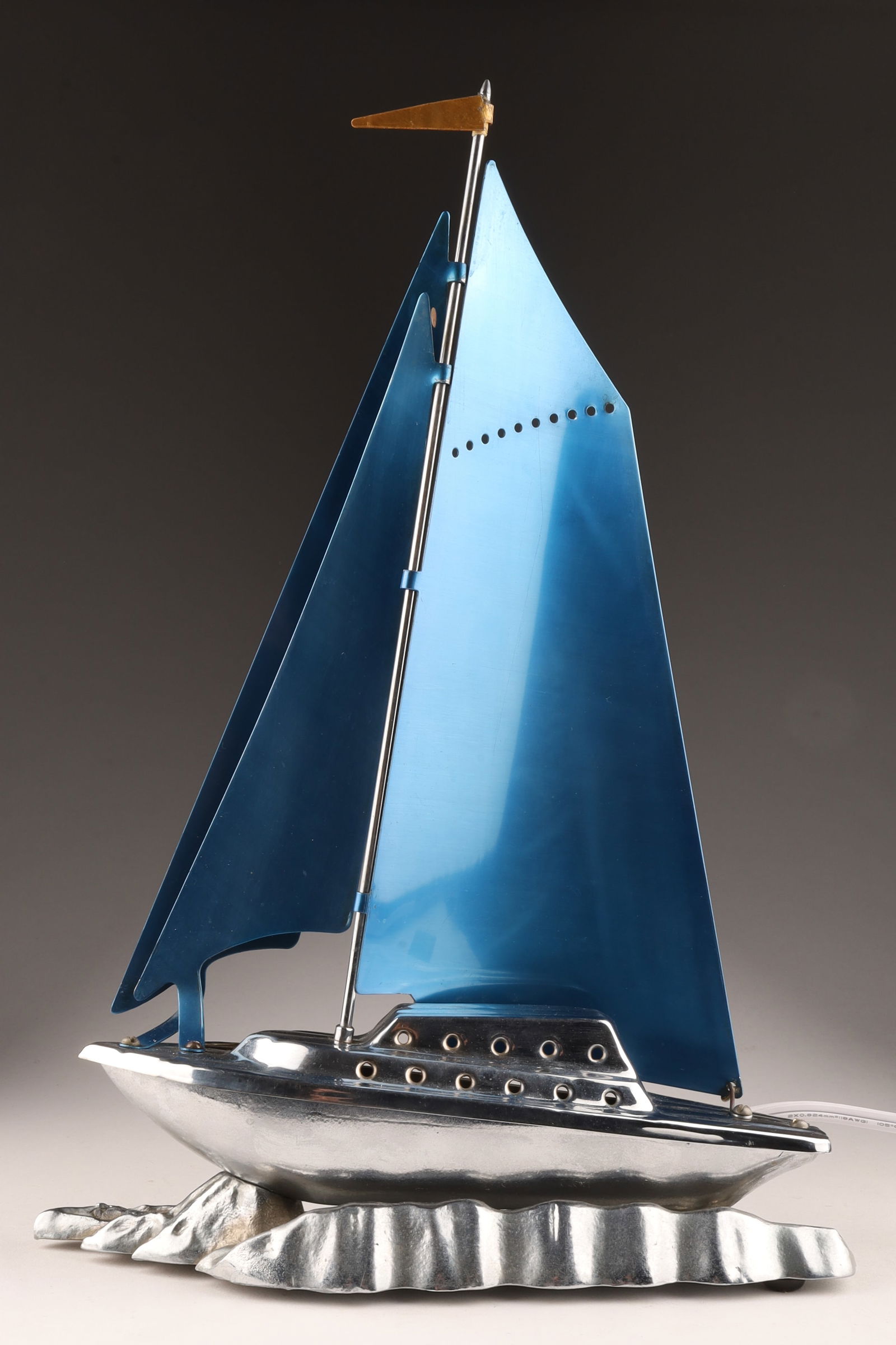 MCM 1950s Chrome TV Lamp Sailboat Metal Sails: Mid Century 1950s Chrome TV Lamp Sailboat with Metal Sails. Measures 15.5 inches H x 10.5 W.