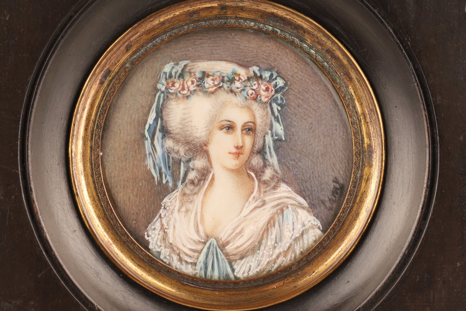 Antique French Miniature Lady Portrait Signed Lamy: Antique French Miniature Lady Portrait Signed Lamy depicting a lady with a wreath of flowers in her hair. Signed centre right. 2.75 inches diameter, frame measures 4.25 inches x 4.25.