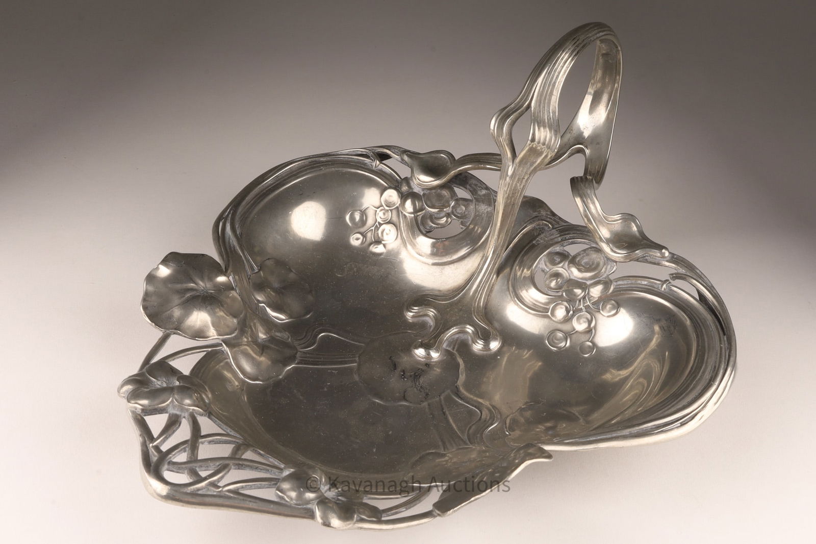 Art Nouveau WMF Silver Plated Water Lily Card Tray: Art Nouveau WMF Silver Plated Pewter Water Lily Card Tray decorated with tendrils of lily pads and flowers. Marked WMF, makers mark. 11.5 inches L x 9.5 x 6 H.