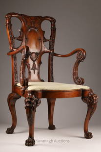 Irish George II Style Carved Walnut Armchair: George II Style Carved Walnut Armchair in the Manner of Hicks of Dublin. Shaped top rail carved with eagle heads, above a cartouche shaped splat carved with scrolls, above a shaped drop-in seat flanke