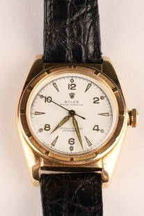 Rolex Oyster Perpetual Bubble Back 1946 14K Watch: Rolex Oyster Perpetual Bubble Back 1946 14K Gold Mens Wrist Watch. Functional but should be serviced. Marked on stem Oyster Rolex. 40 mm x 30 mm W, crystal measures 25mm, 10.25 inches L with strap.