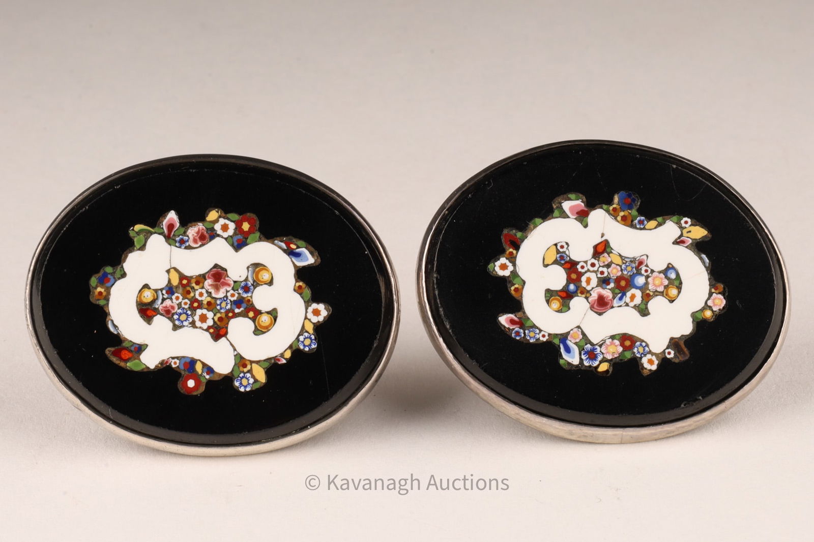 Pair of Micro Mosaic Millefiori Onyx Cufflinks: Pair of cufflinks with micro mosaic Millefiori design on onyx. 1.75 inches x 1.5 x 1 deep.