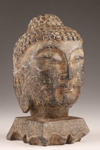 Chinese Stone Carved Buddha Head: Chinese Stone Carved Buddha Head. 6 inches H x 3 x 3. Chips to carved base.