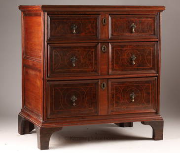 Early 18th C Transitional Moulded Oak Chest: Late 17th - Early 18th C English Transitional Moulded Oak Chest of Drawers with Walnut Veneered Fronts and Top Banding, later feet, brass drop handles, geometric pattern string inlay on drawer fronts.