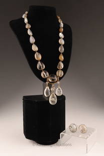 14K Gold and Rock Crystal / Citrine Demi Parure: 14K Gold and Polished Rock Crystal, Smokey Quartz, Citrine and Agate Necklace and Clip on Earrings. Necklace measures 24 inches, pendant grouping measures 3.25 inches L, earrings measure 1 inch, hallm