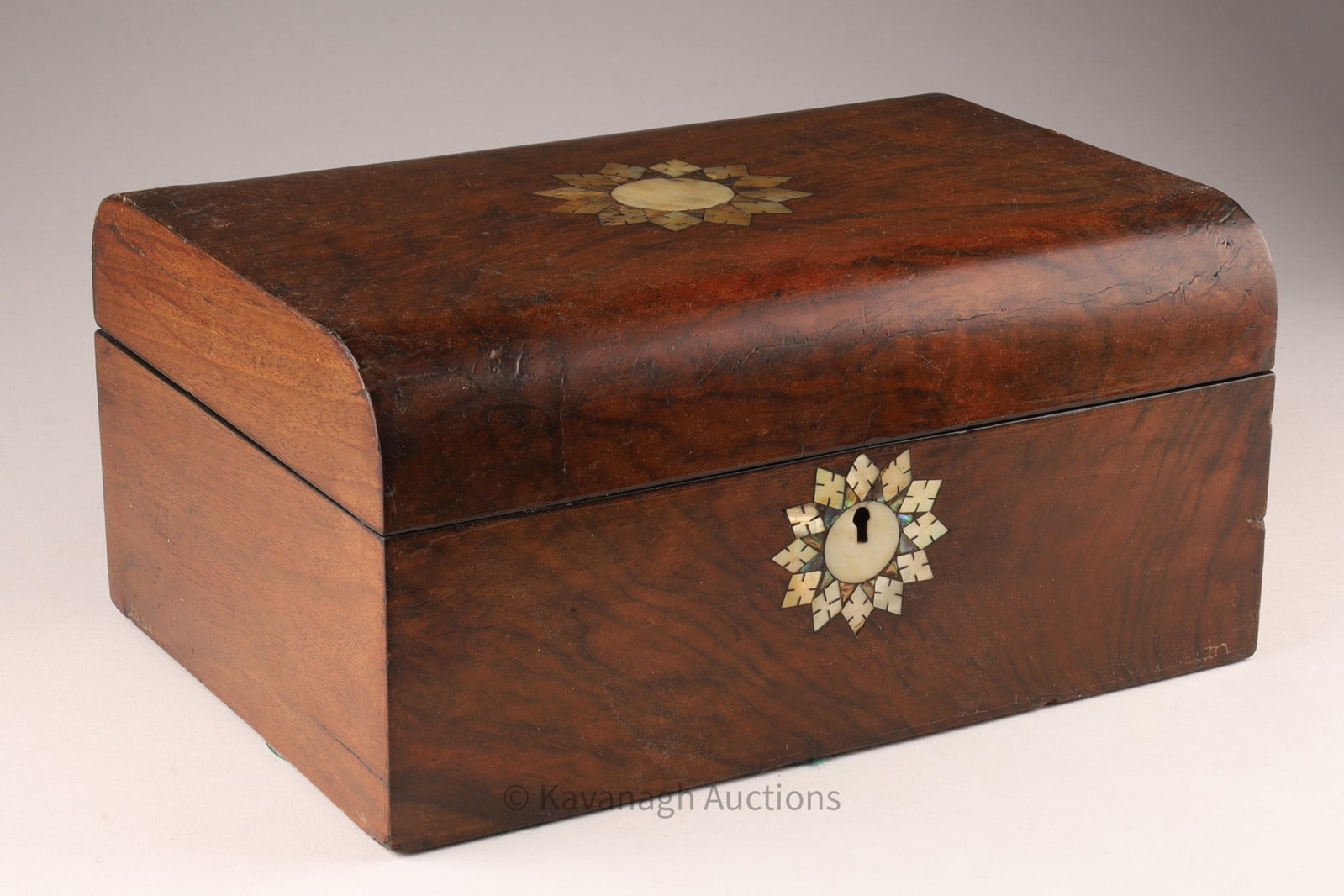 Victorian Mother of Pearl Inlaid Necessaire Box: Victorian Mother of Pearl Inlaid Necessaire Jewelry Box, with decorative mother of pearl inlaid cartouche and matching keyhole escutcheon. 5.5 inches H x 10.5 L x 8 W.
