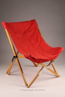 Vintage Tripolina Folding Butterfly Chair: Vintage Tripolina Folding Butterfly Chair with metal braces, wood frame and red canvas seat. Fabric has been restitched along one hem. Approximately 43 inches H x 29.5 deep x 33.5 W.