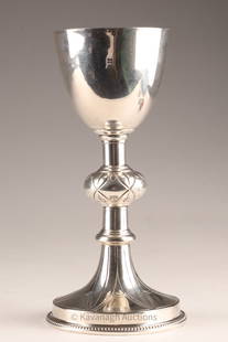 French Sterling and Gilt Travelling Chalice: French Sterling and Gilt Travelling Chalice. Cup hallmarked with Minerva mark, weighs 59.2 grams. Silver plated base. 7.5 inches H x 3.5 W at base.