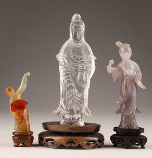 Group Chinese Crystal Agate Figural Lady Carvings: Group Chinese Figural Carvings, Crystal, Agate, purple hardstone. Crystal Guanyin on stand measures 7.5 inches H, figure measures 6.5 inches H x 2.5 W, purple hardstone figure on stand measures 6 inch